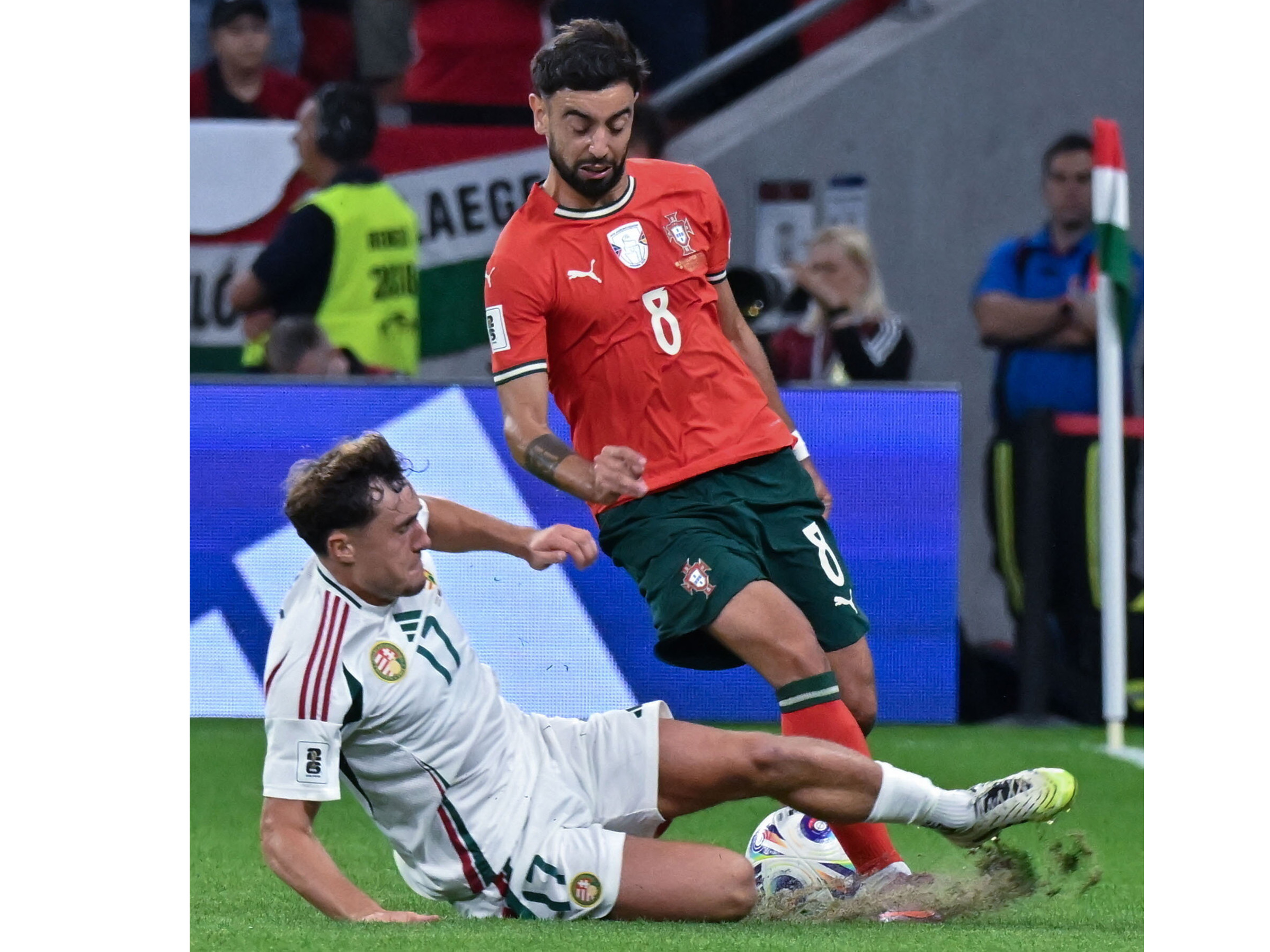 Callum Styles making a challenge for Hungary against Portugal