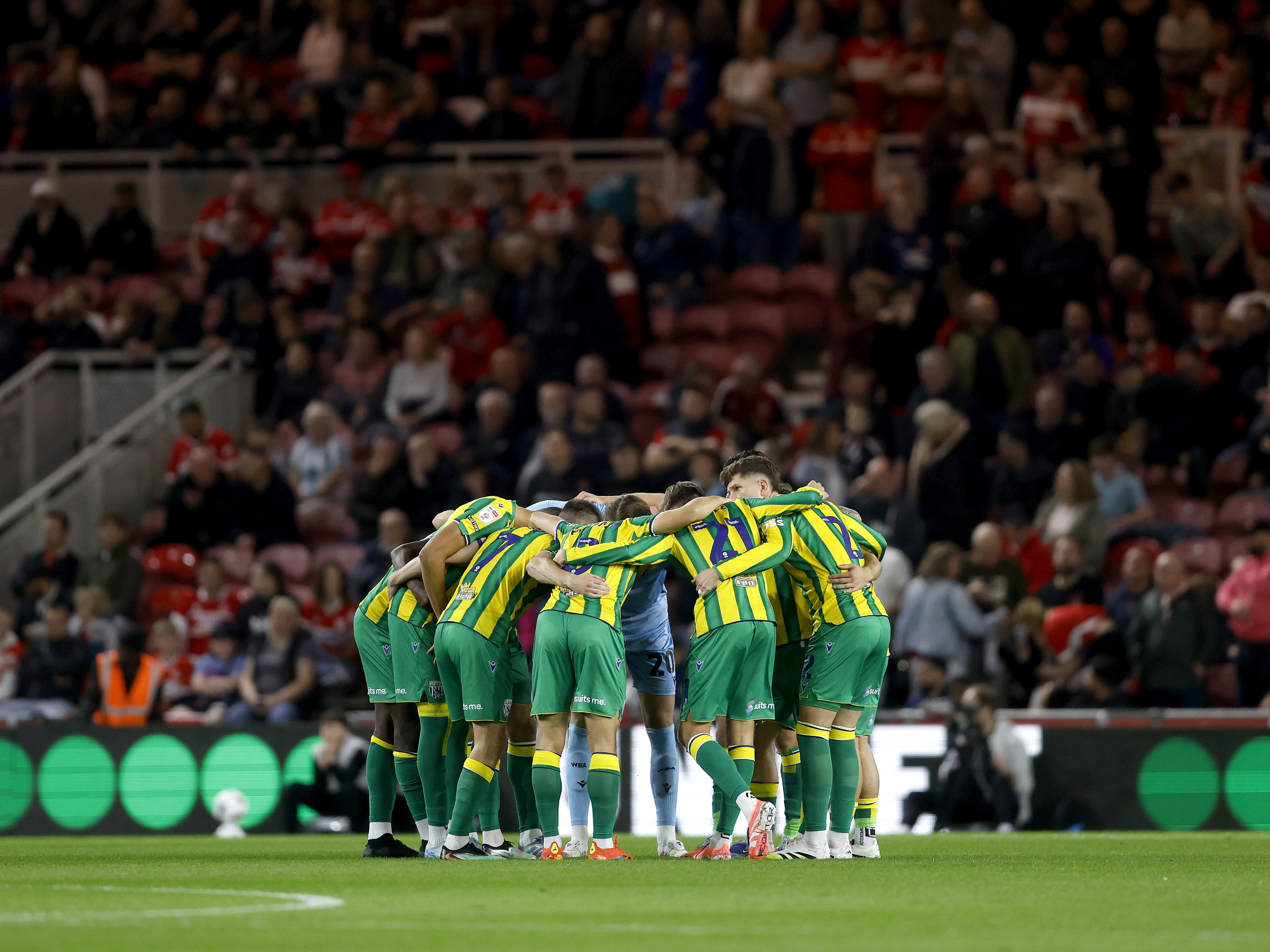 An image of a team huddle before Albion's game against Middlesbrough