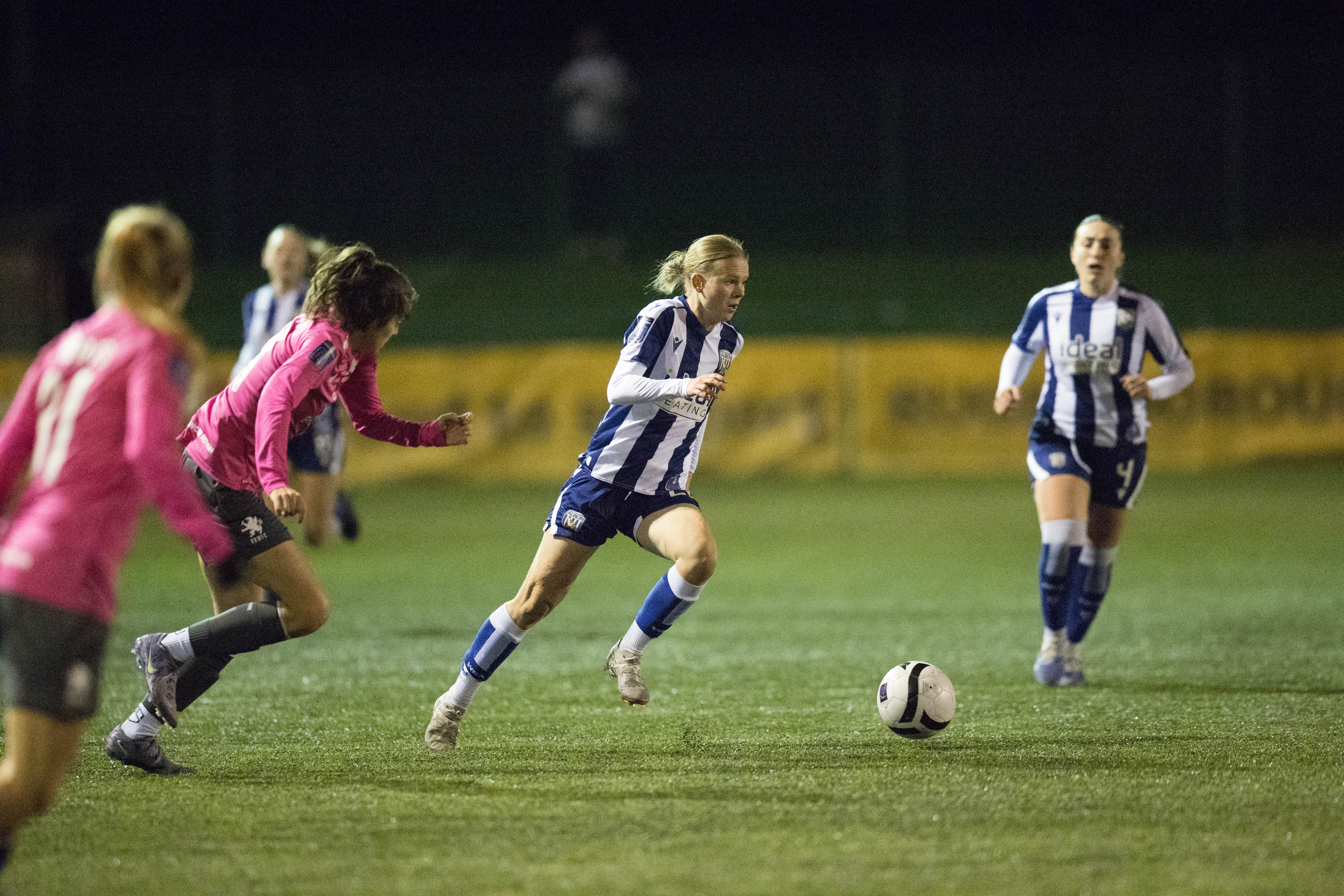 Phoebe Warner in action against Rugby Borough.
