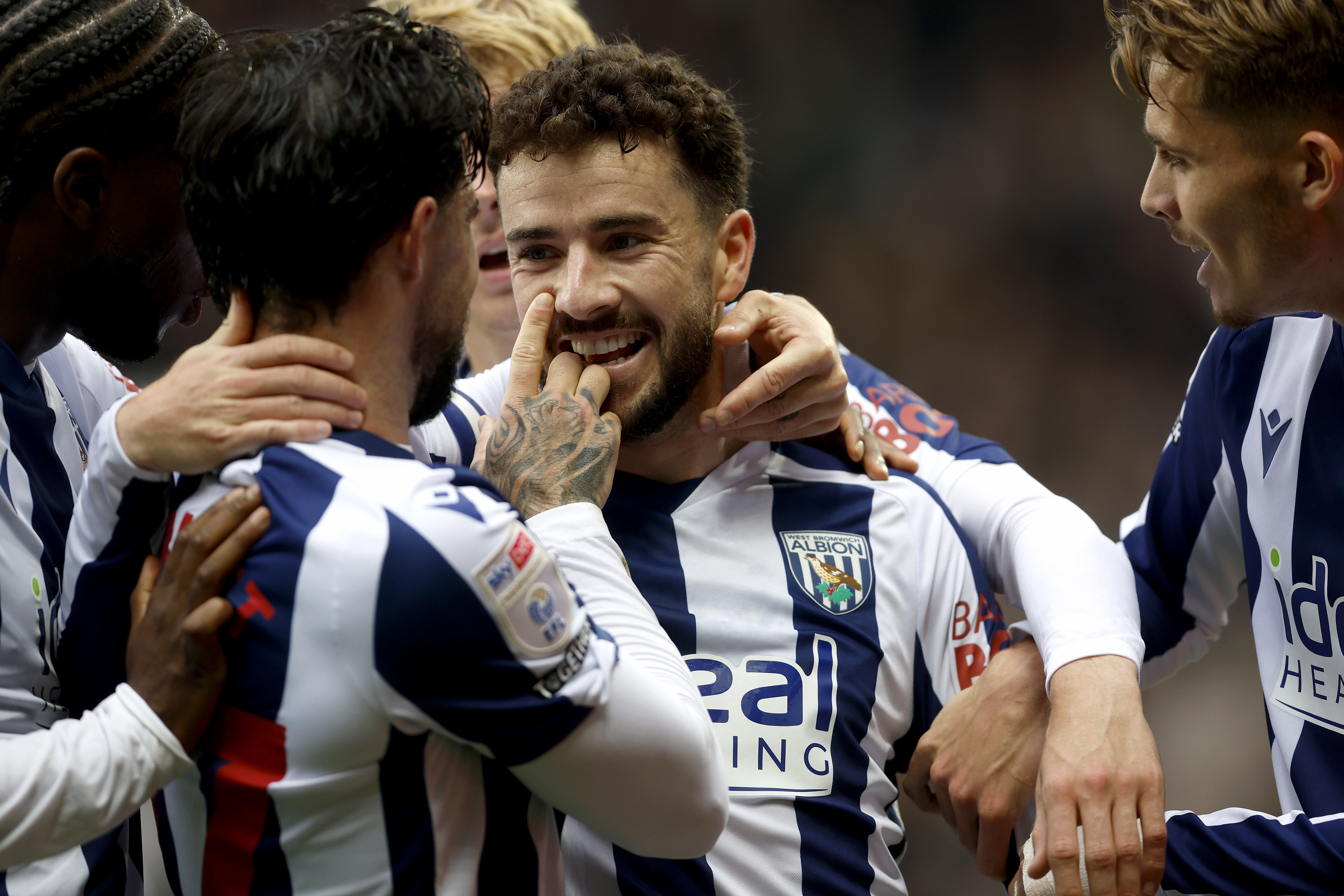 Mikey Johnston celebrates scoring against PNE with team-mates