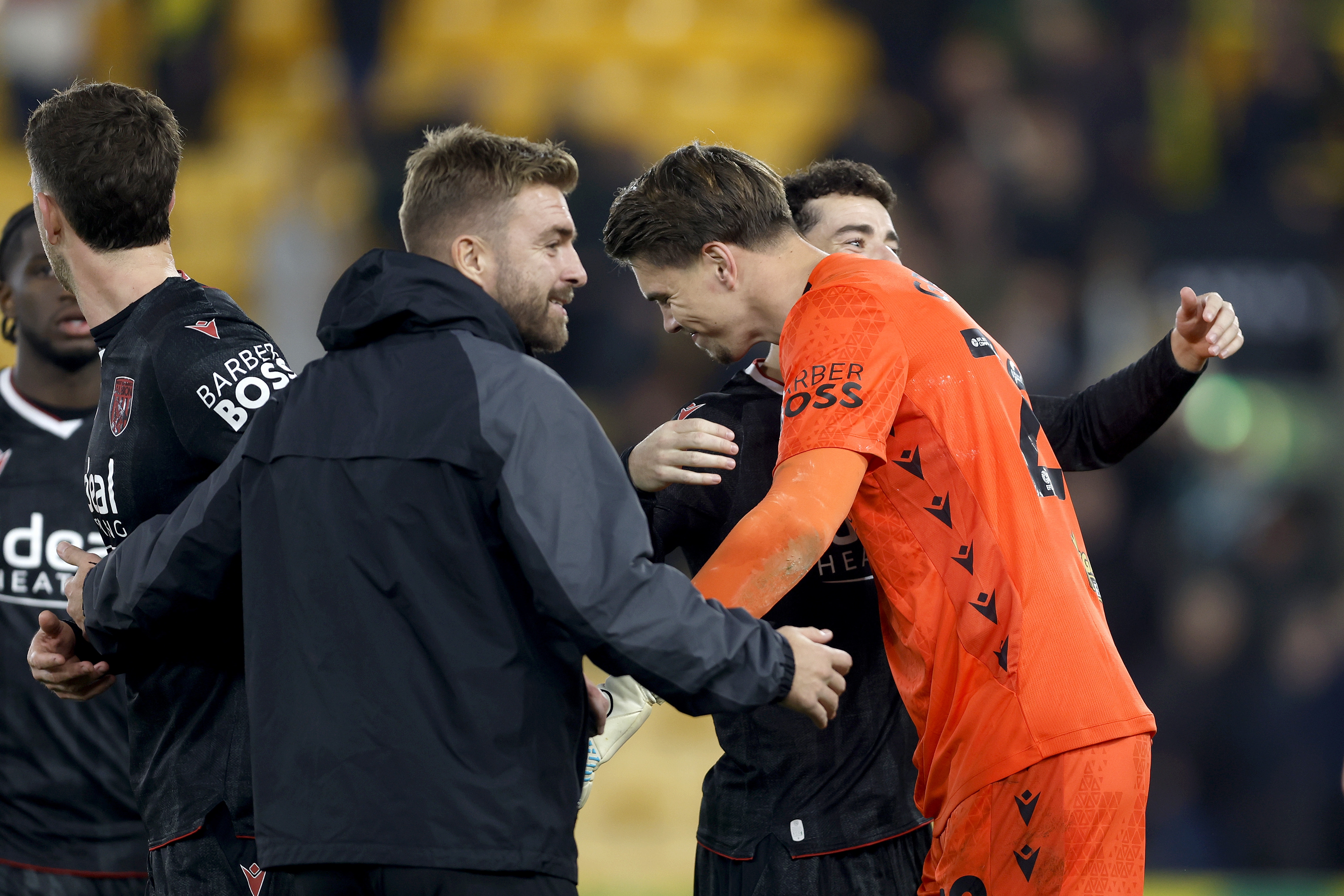 Josh Griffiths is congratulated by James Morrison at full-time against Norwich 