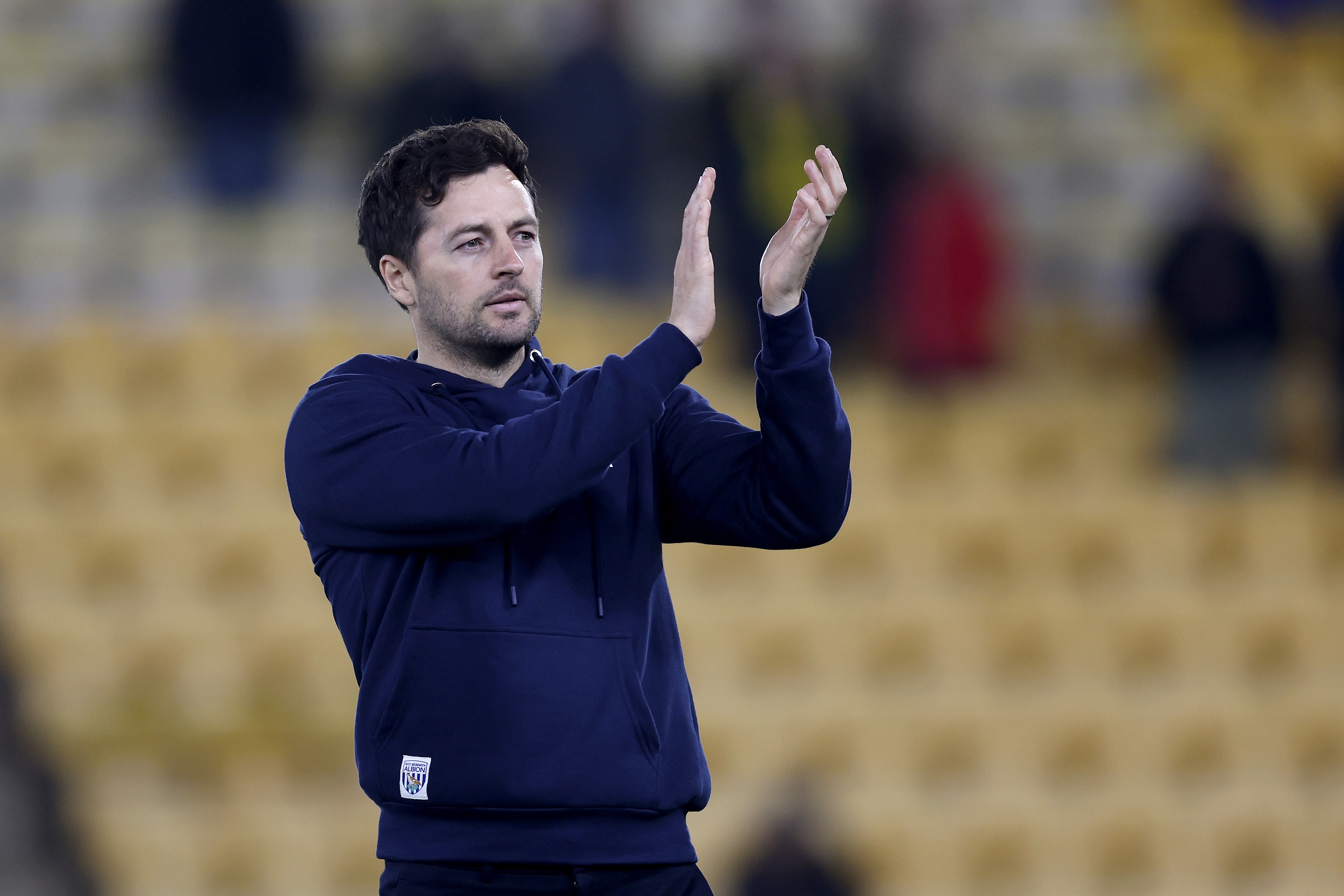 Ryan Mason applauding WBA fans after beating Norwich 