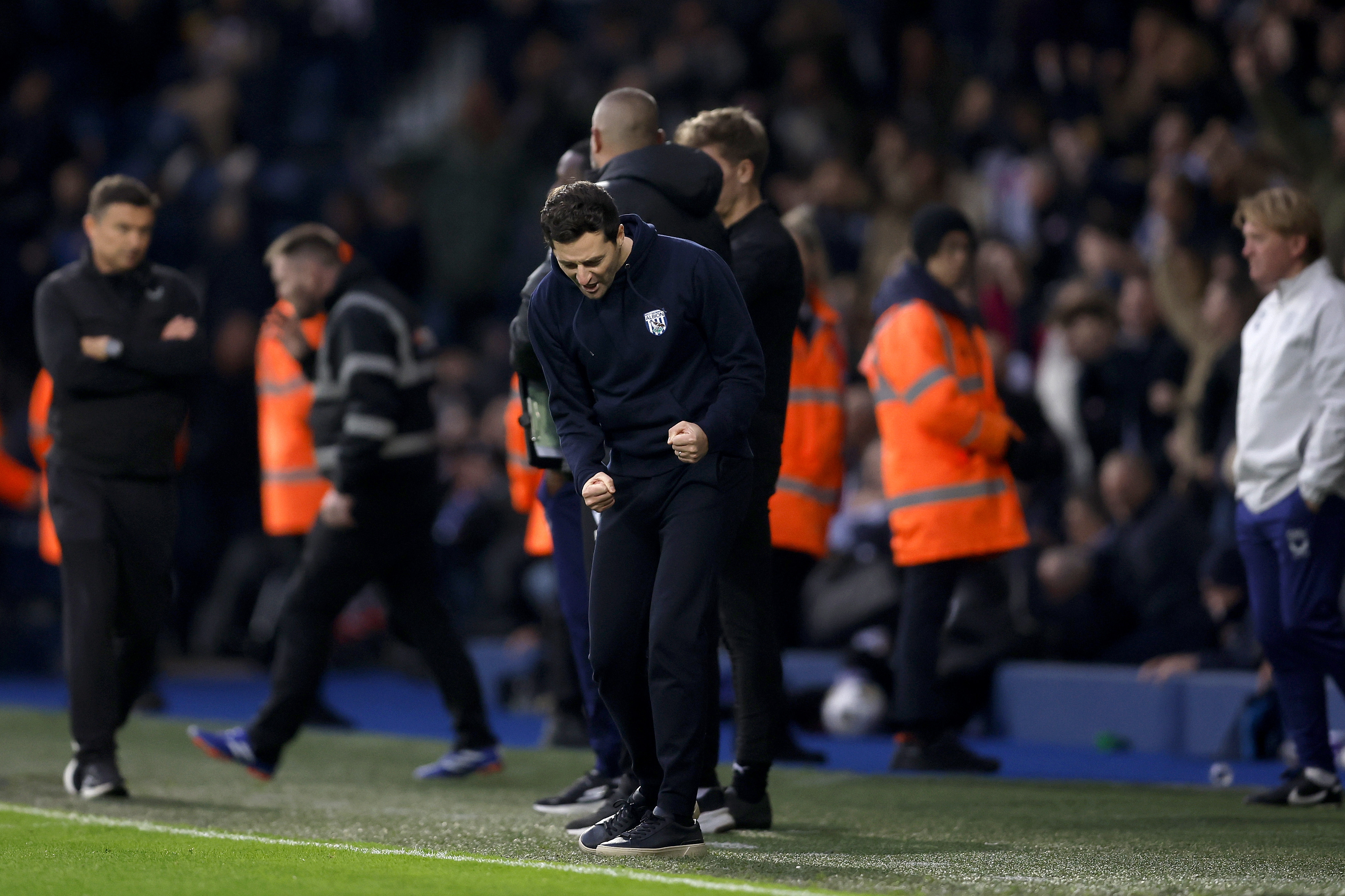 Ryan Mason celebrates on the touchline at The Hawthorns after beating Preston