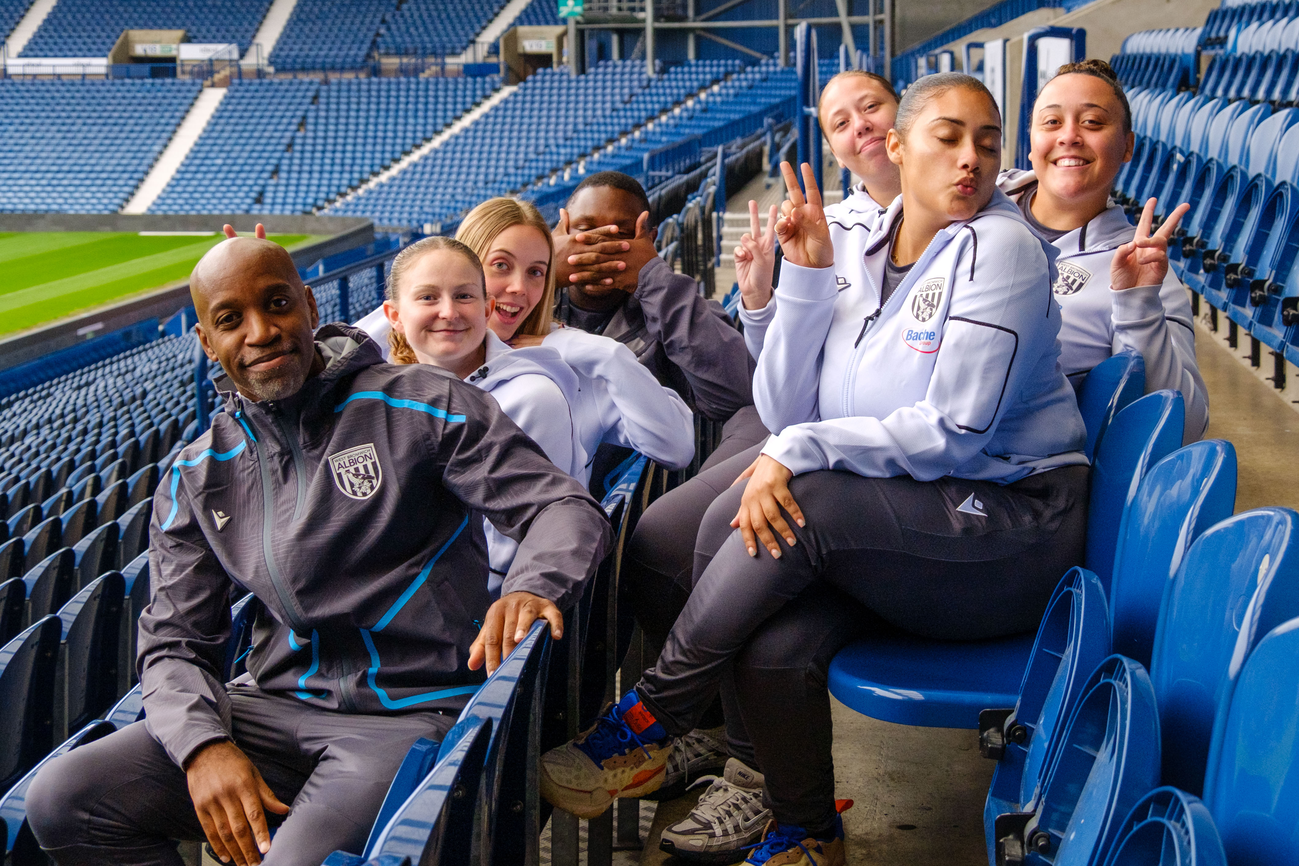 Building Futures doing fun poses for team photo.