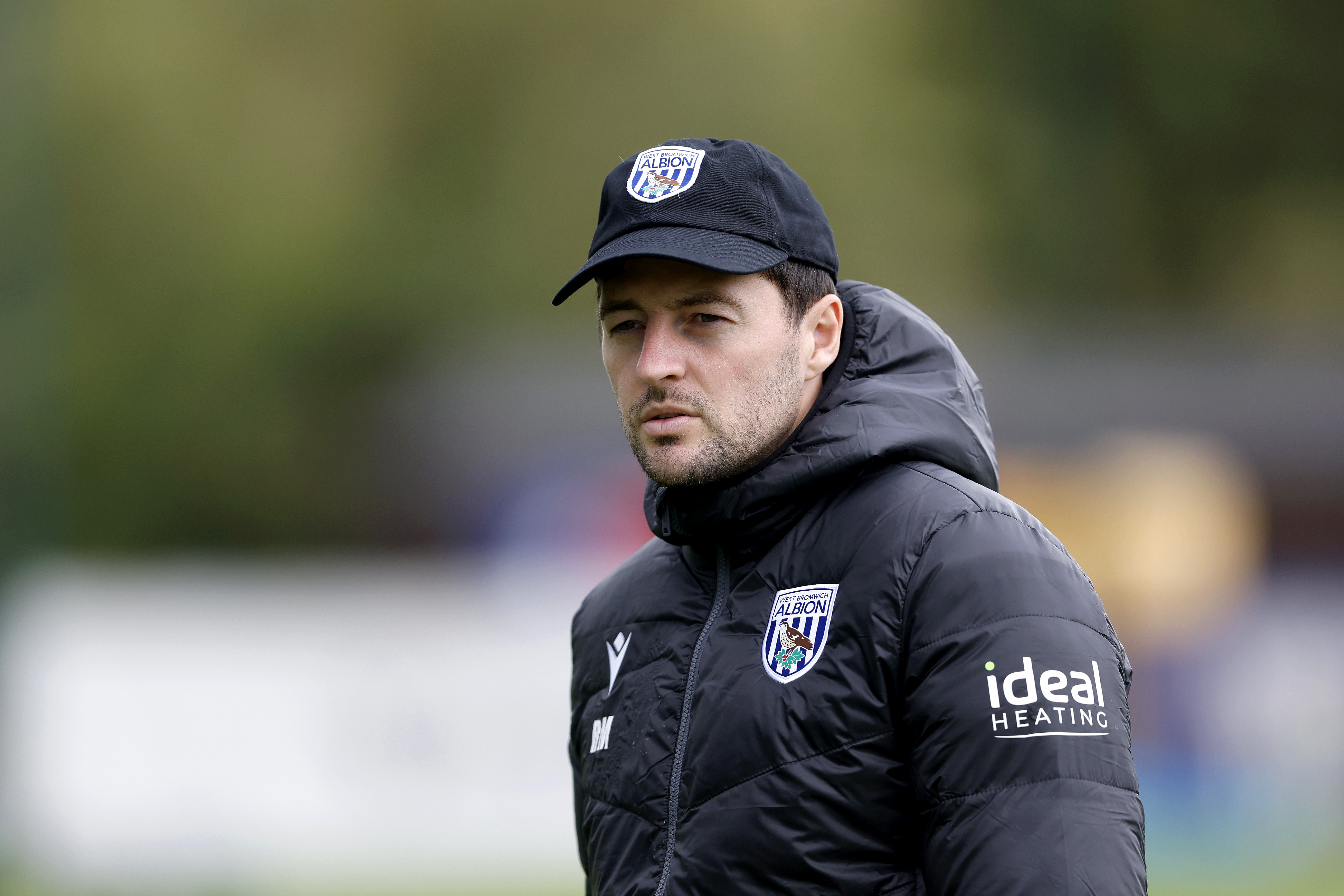 Ryan Mason with a cap on during a training session