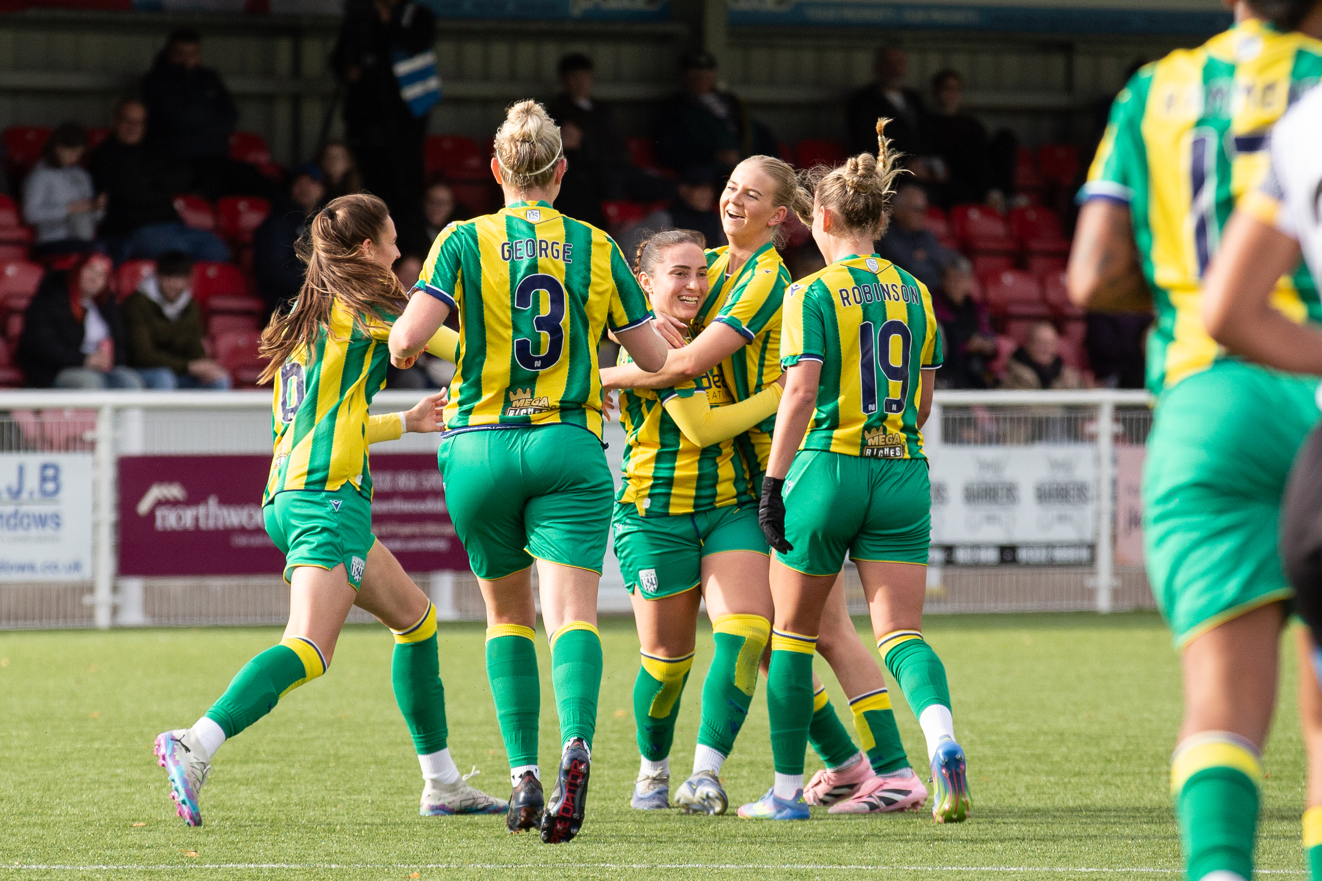 Albion Women celebrating.