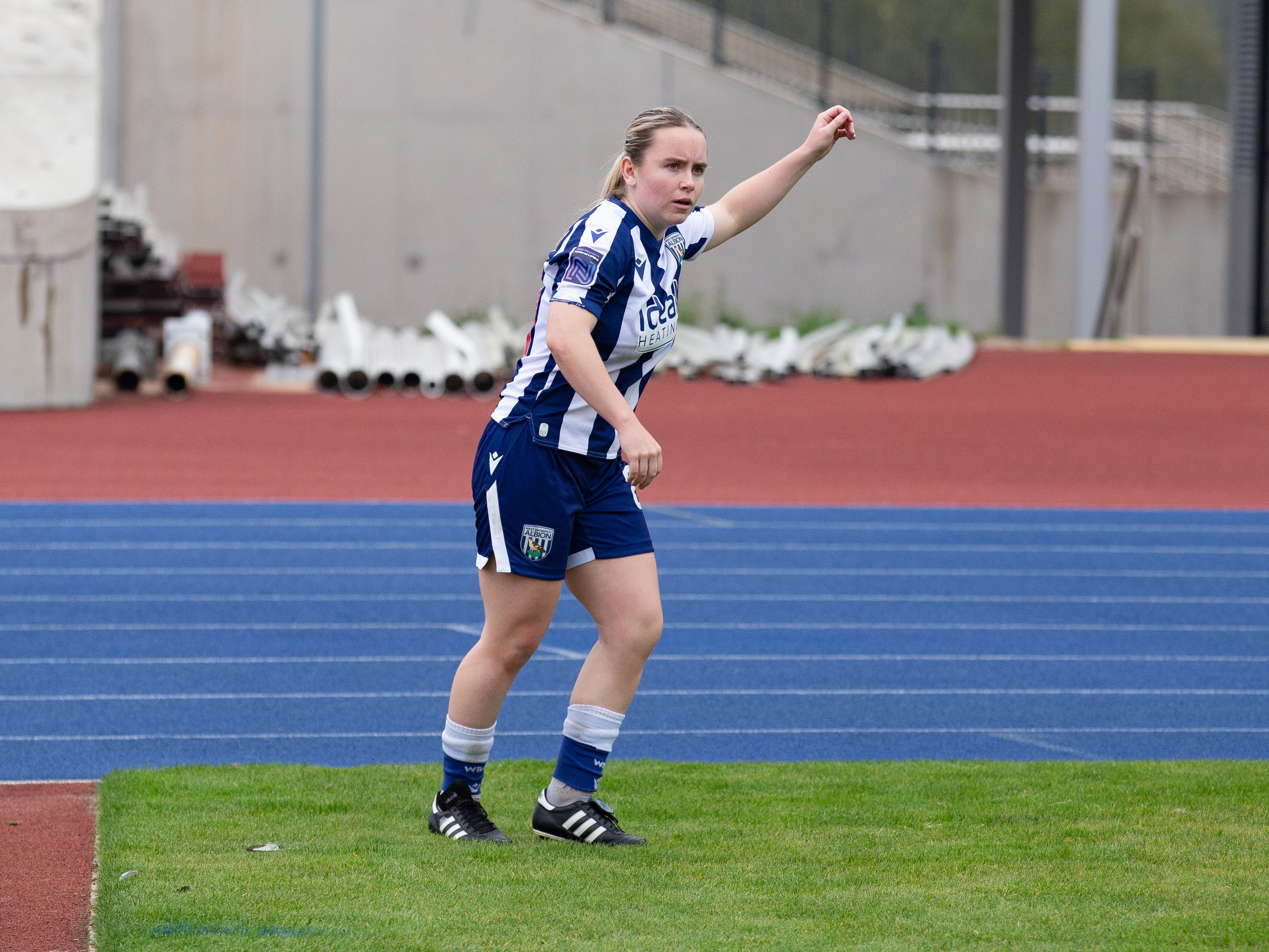 Ella Haughey taking a corner in the home kit 