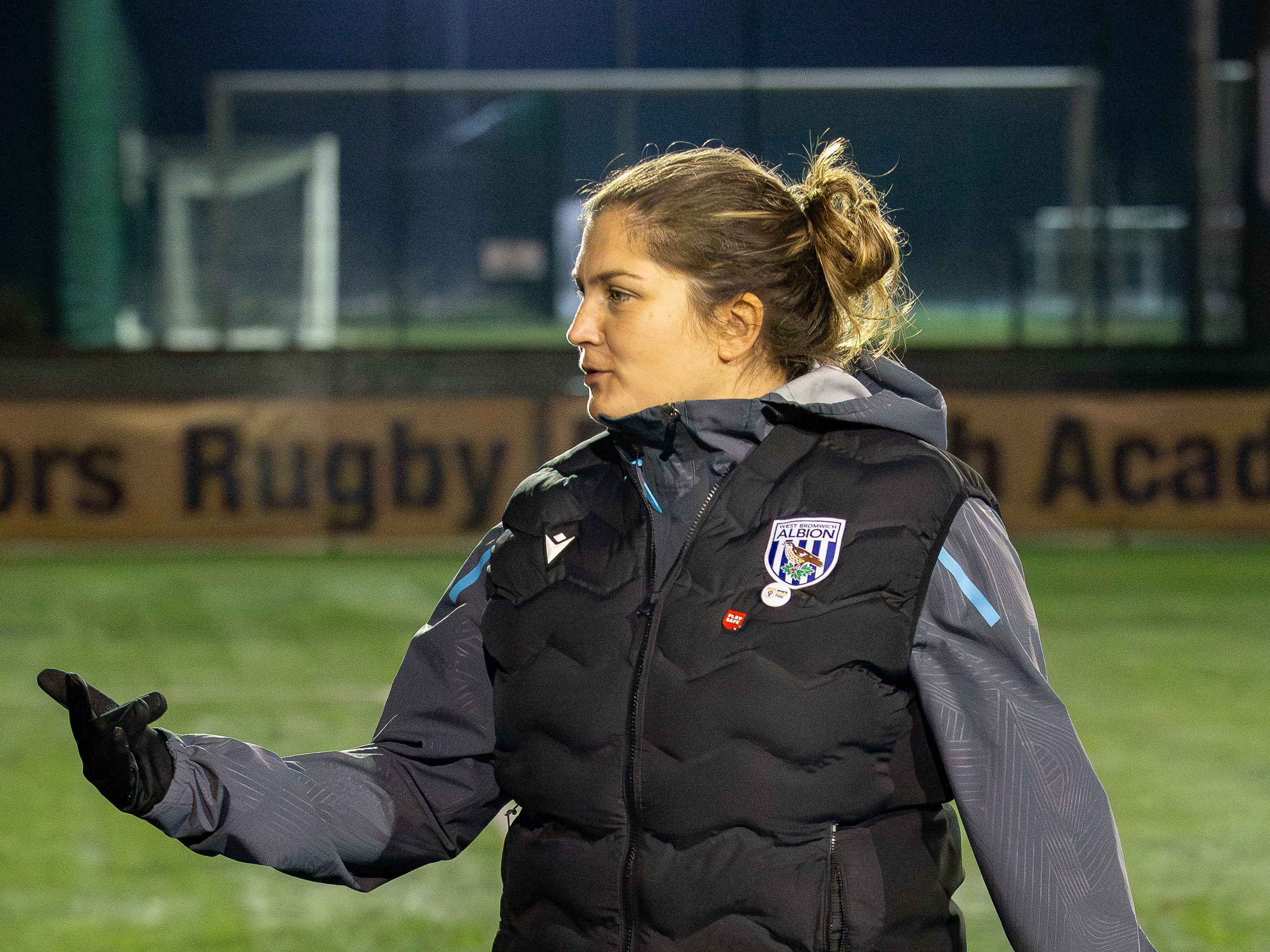 Siobhan Hodgetts-Still in a WBA coat before a game 