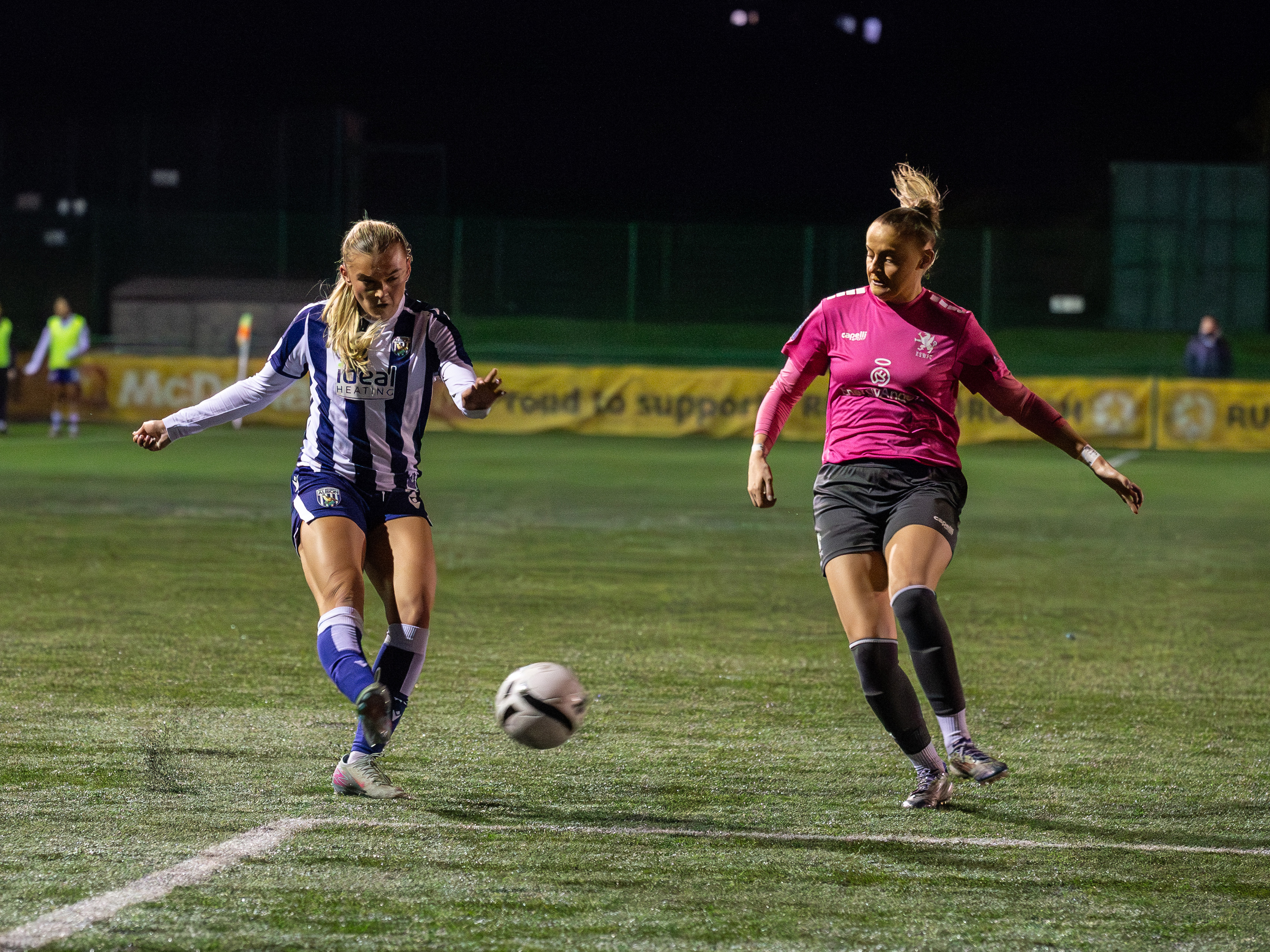 Taylor Reynolds crossing the ball against Rugby 