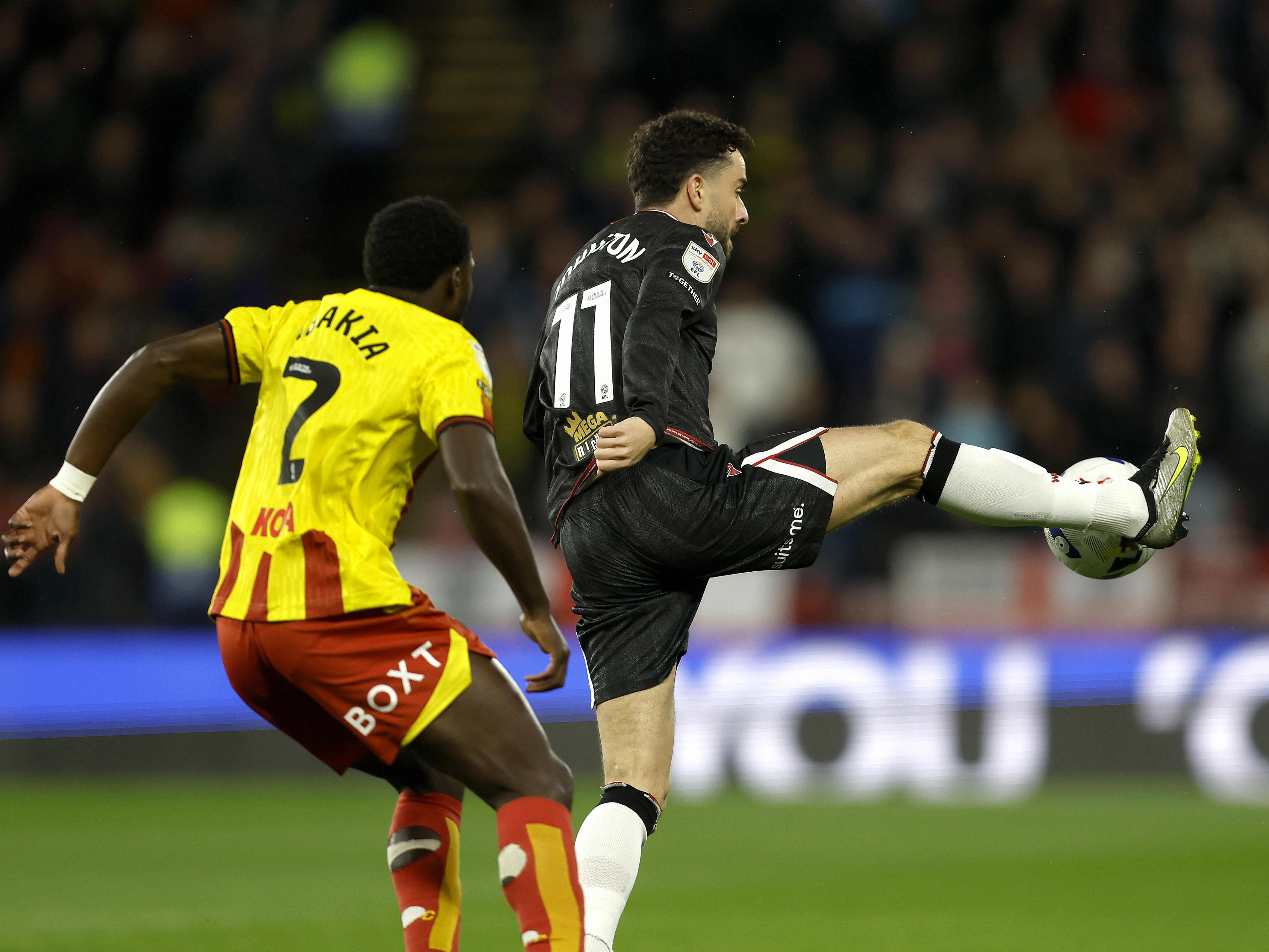 An image of Mikey Johnston playing against Watford