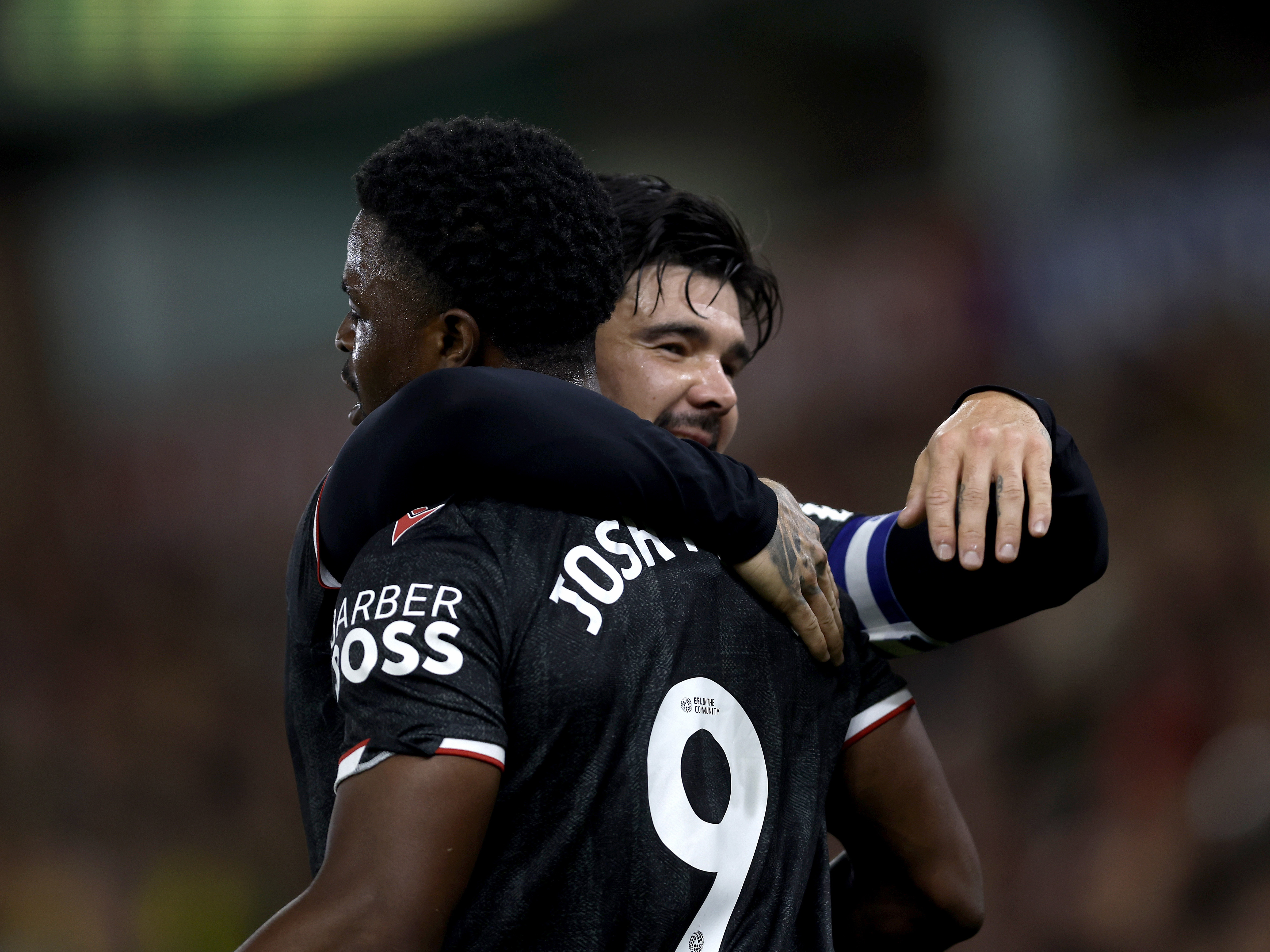 An image of Alex Mowatt and Josh Maja celebrating a goal against Norwich