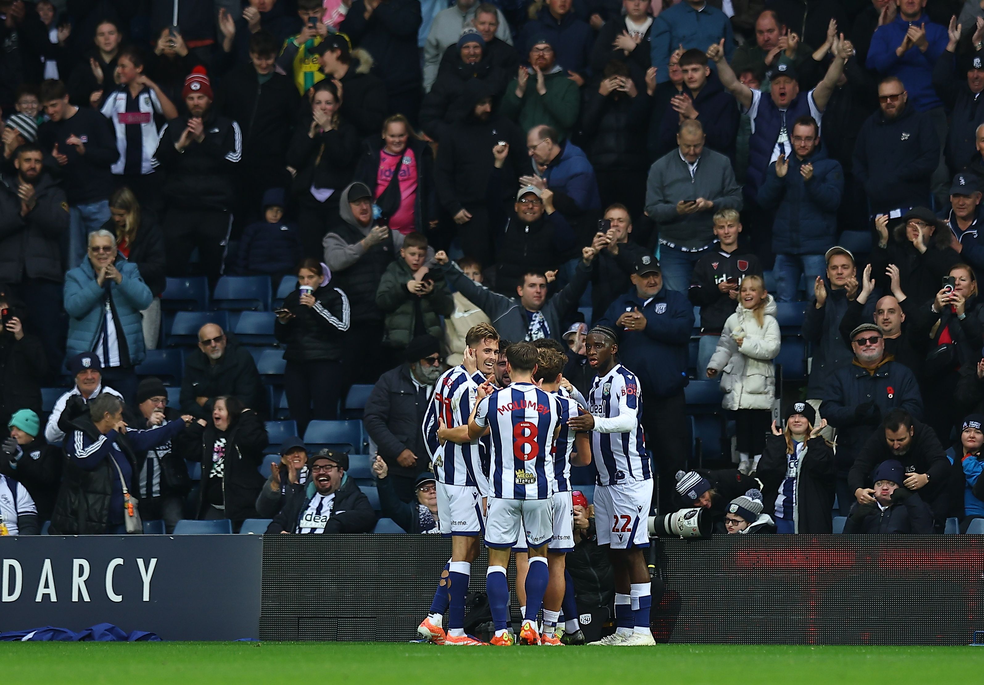 Isaac Price celebrates scoring against PNE with team-mates 
