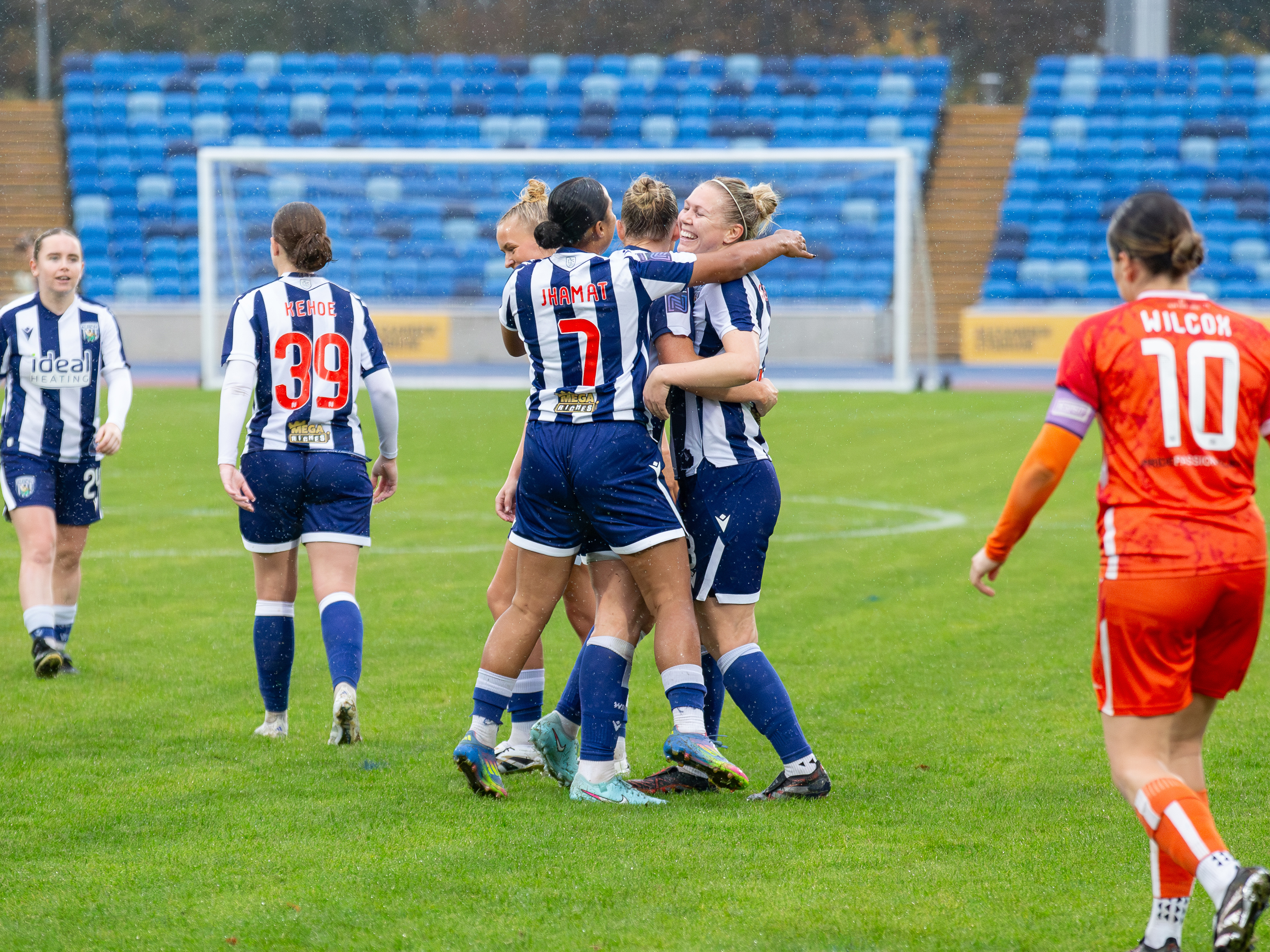 An image of Albion Women celebrating a goal against Boldmere