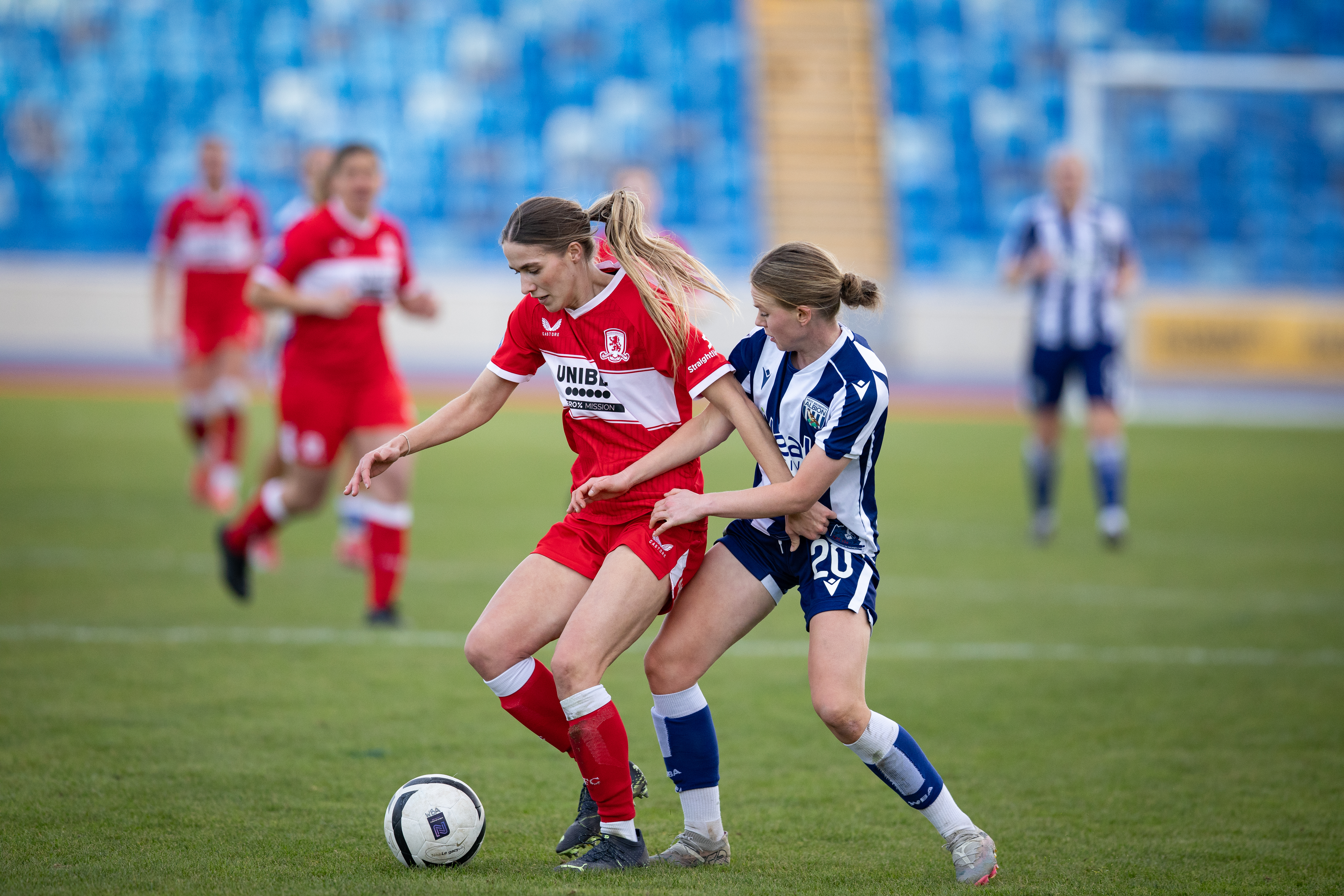 Phoebe Warner battles for the ball.