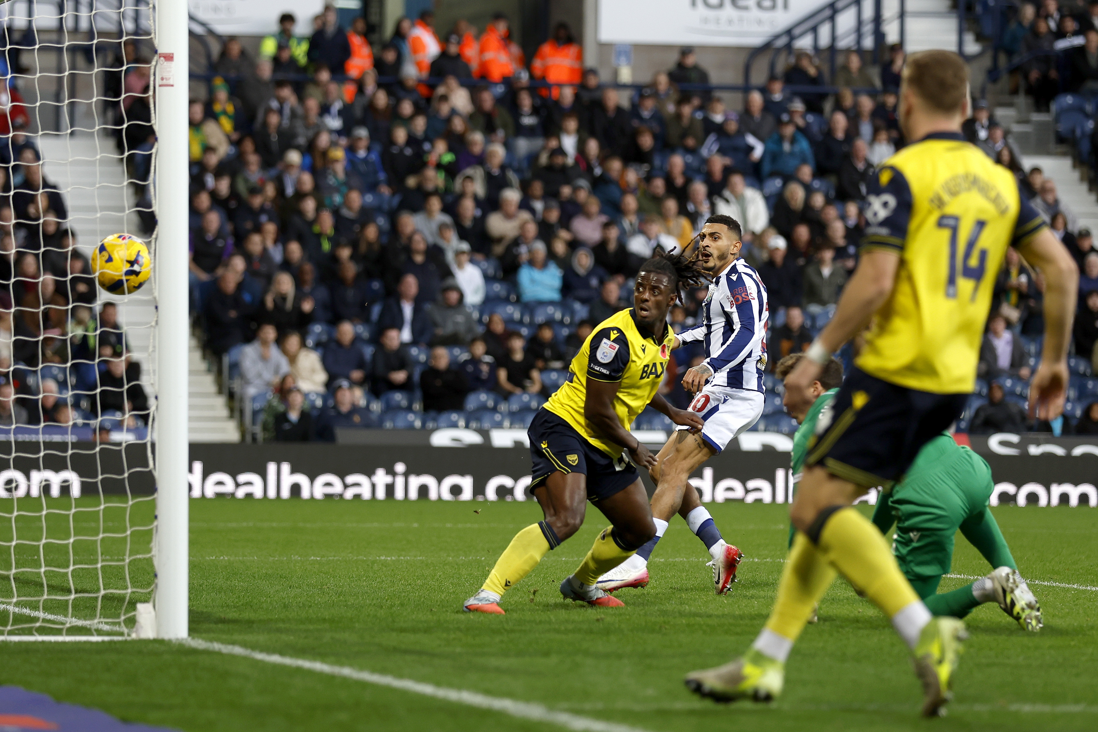 Oxford's Greg Leigh scores an own goal