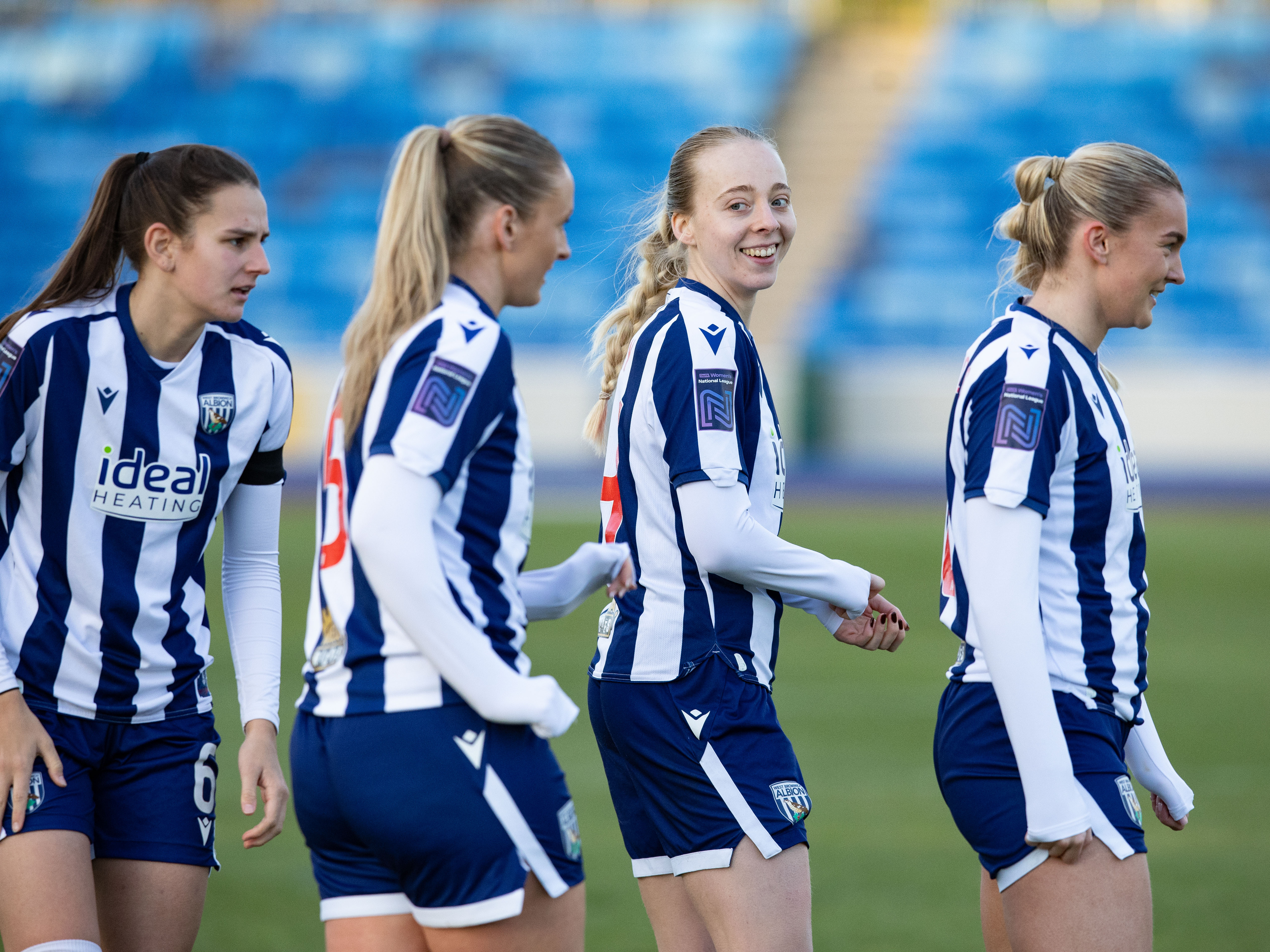 A photo of Ellie May celebrating a goal. 