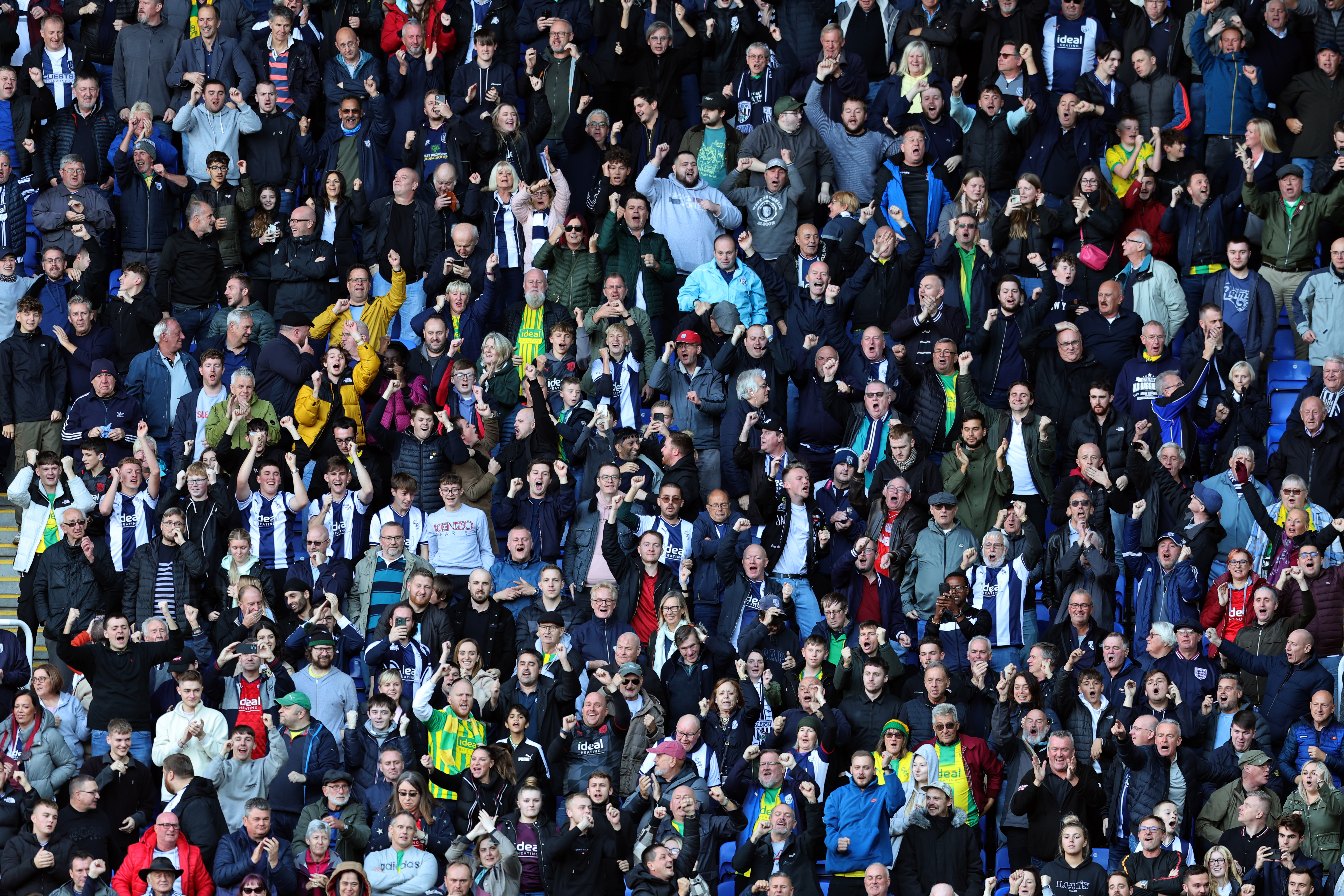 A general view of several WBA fans in the stand at a game