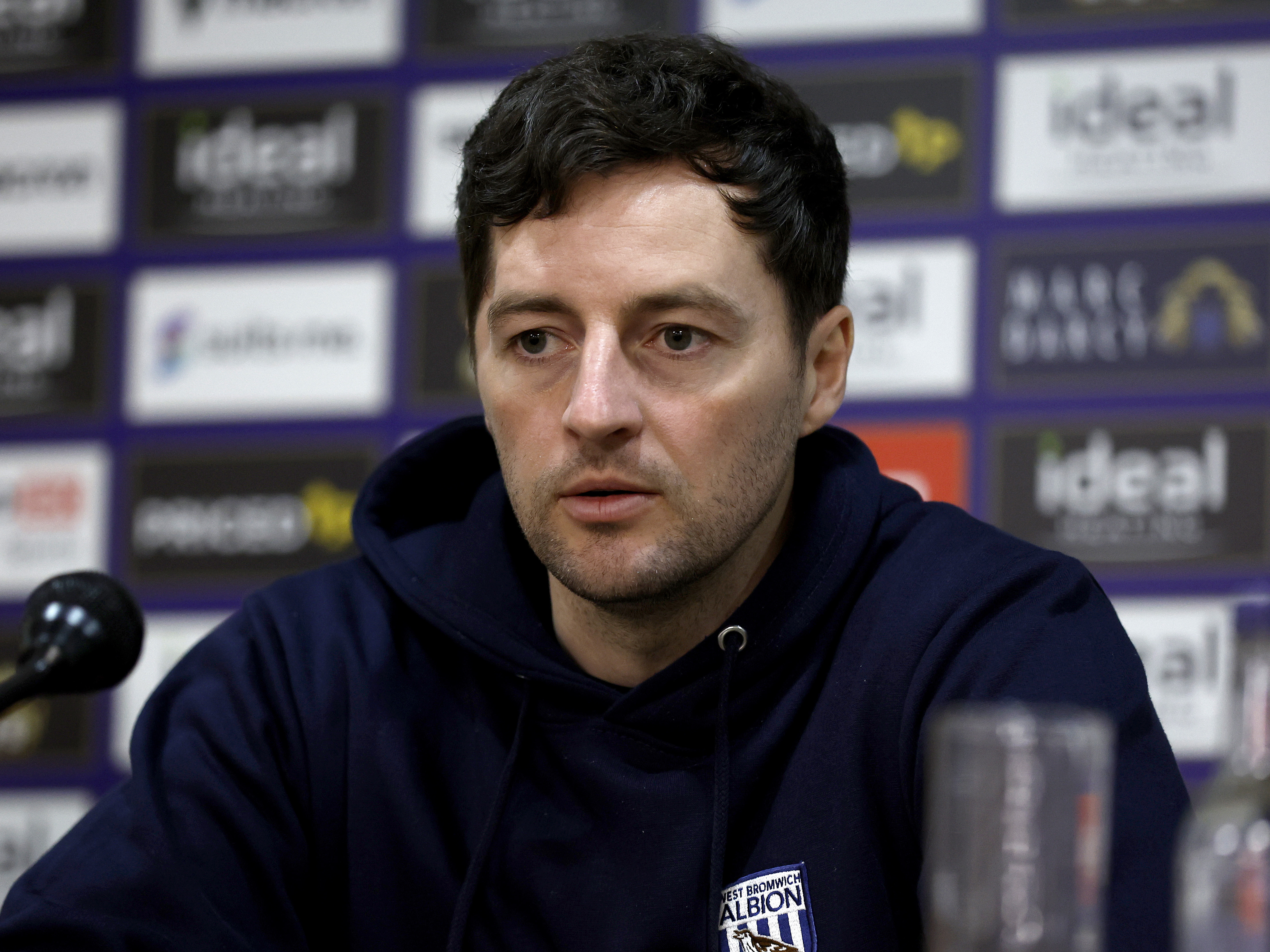 Ryan Mason speaking to the media during a press conference 