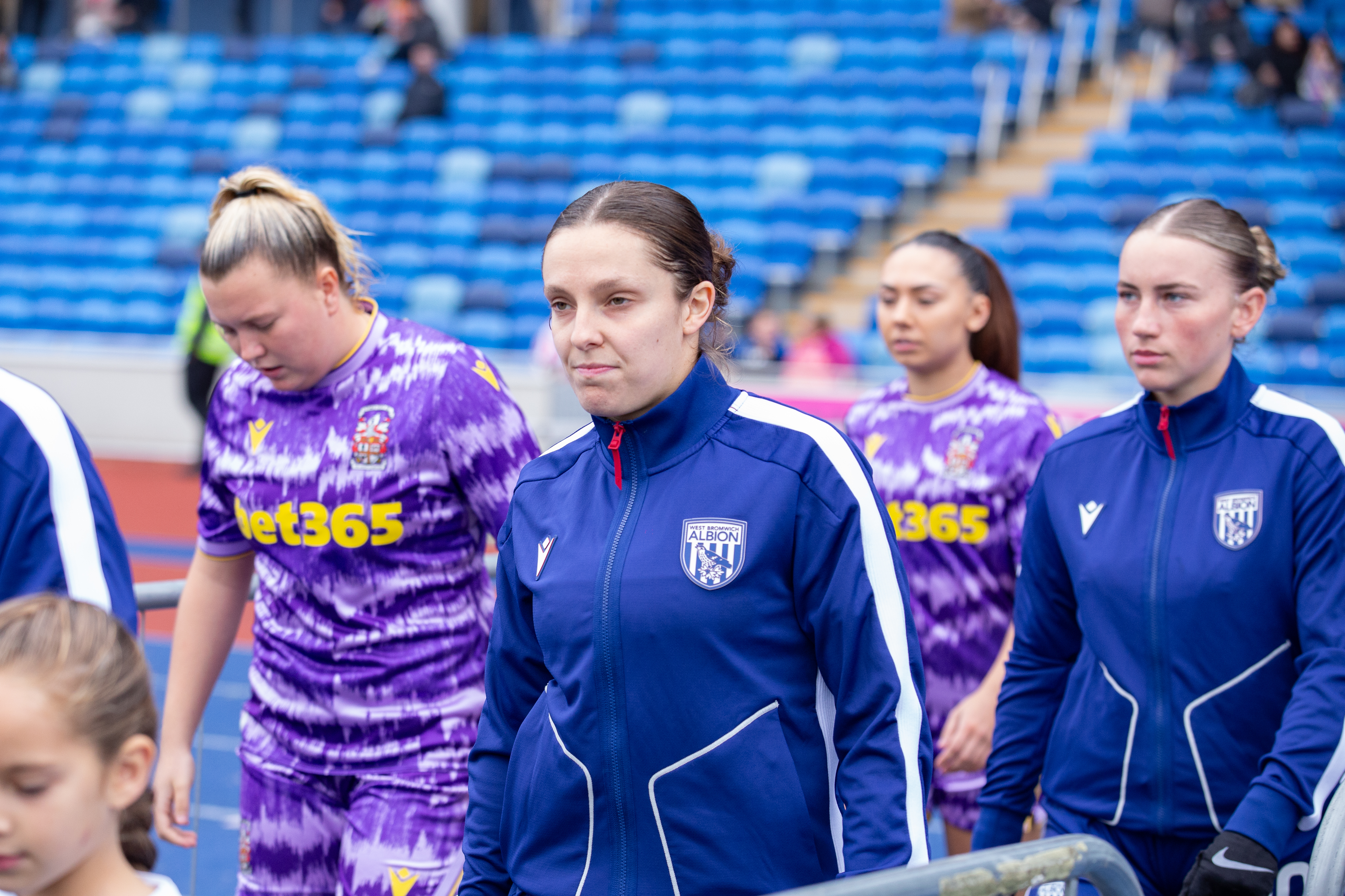 Kate Evans walks out against Stoke City.