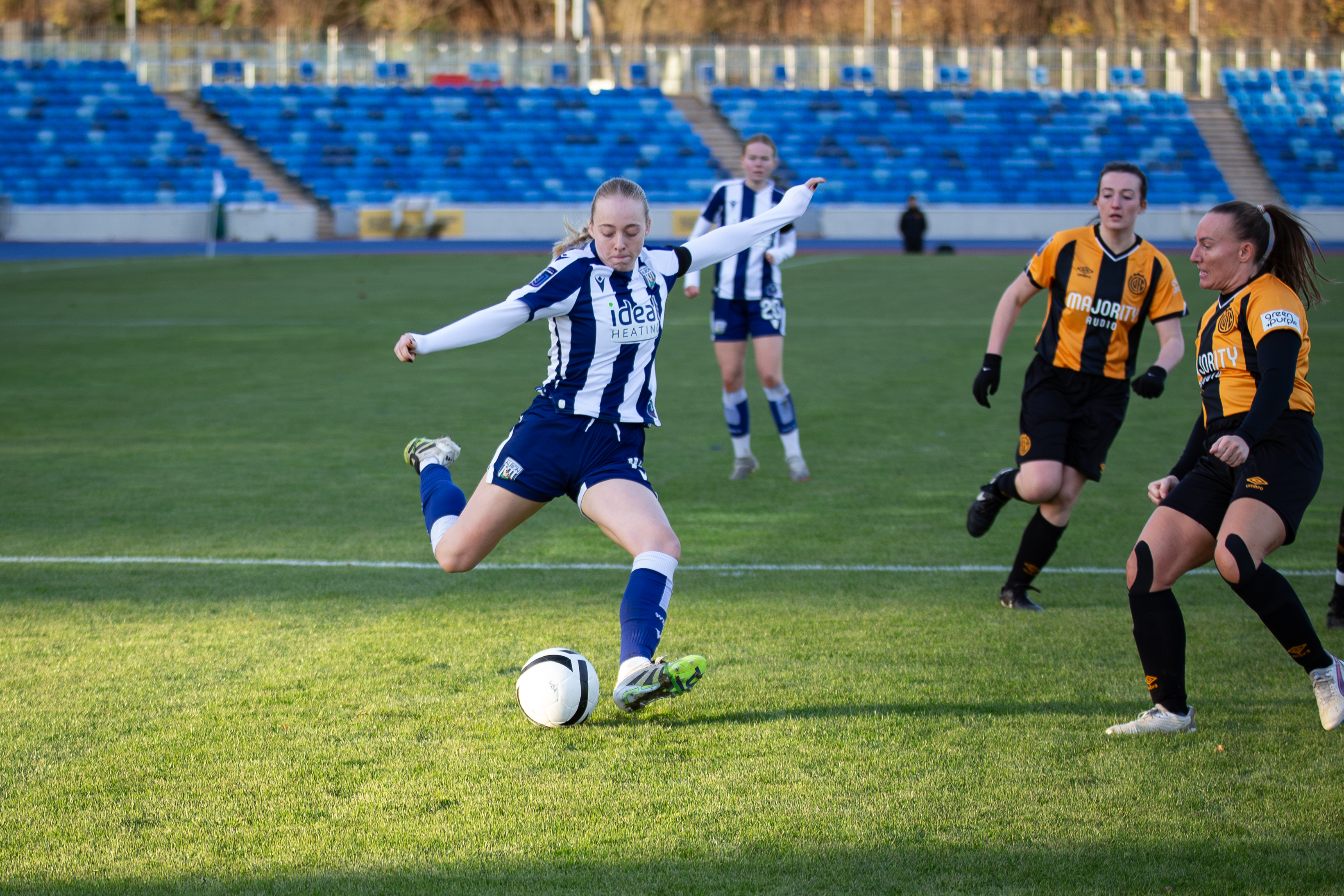 Ellie May shoots against Cambridge.