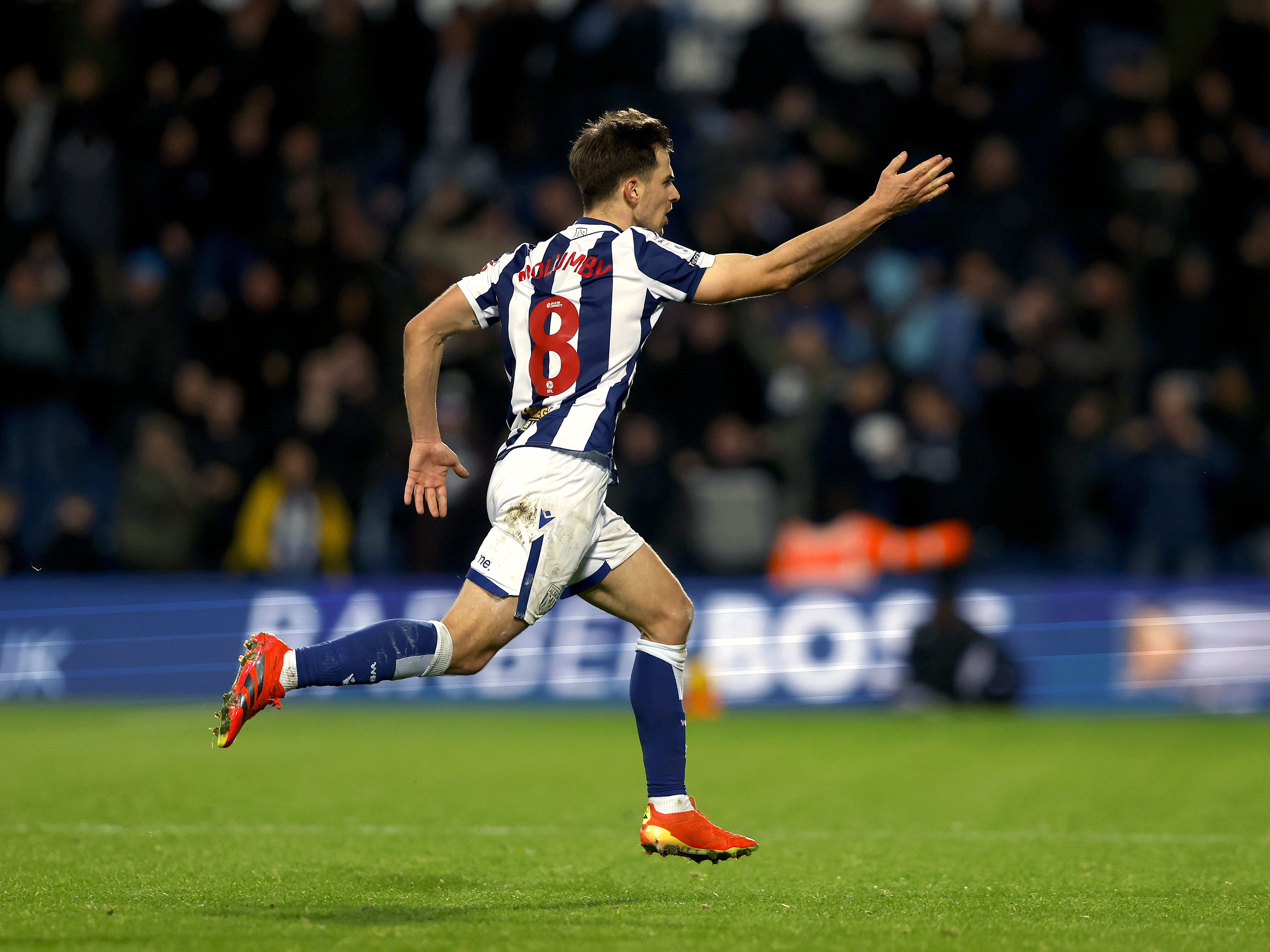 An image of Jayson Molumby celebrating his goal against Swansea