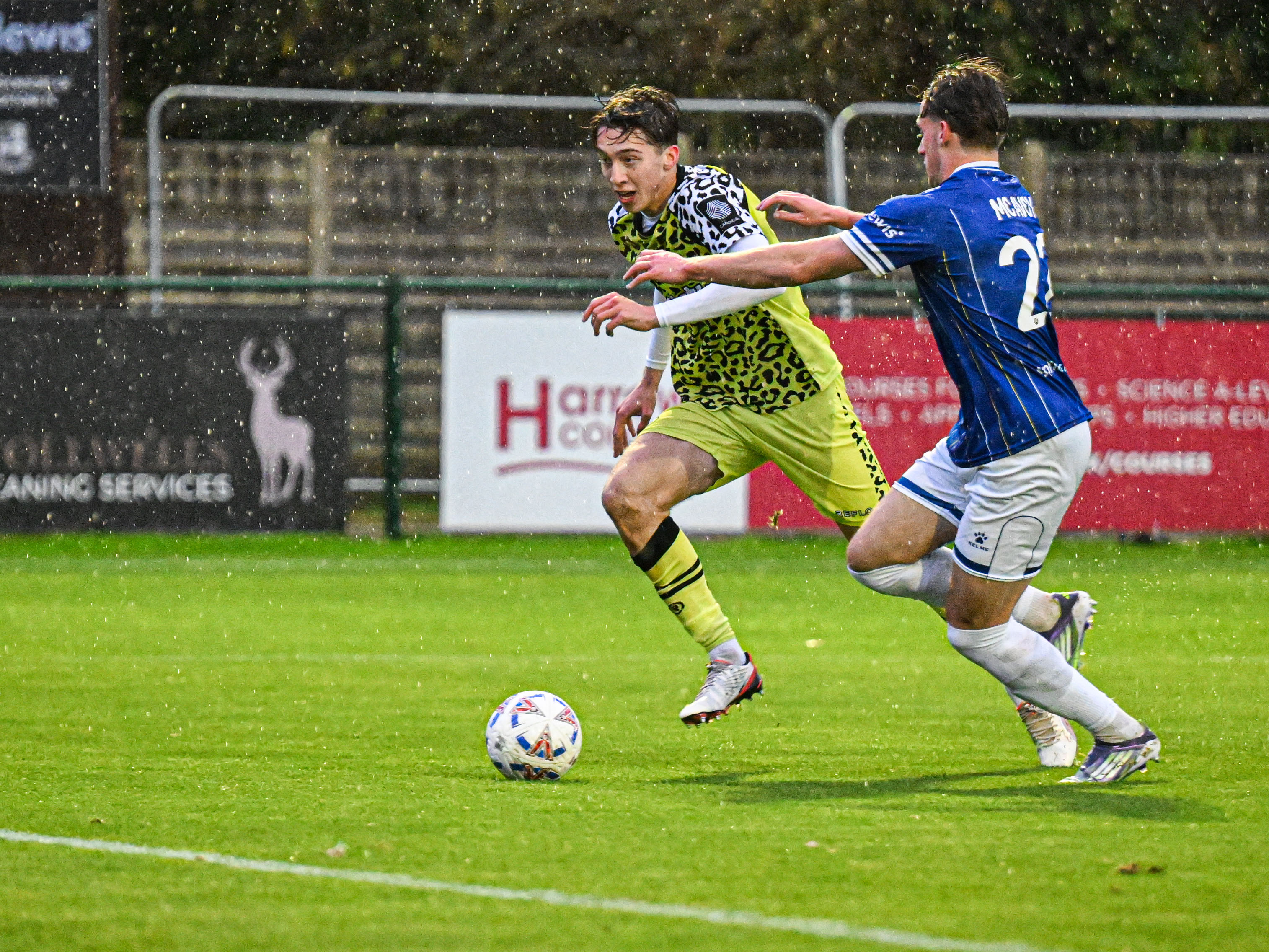Harry Whitwell taking on a Wealdstone defender.