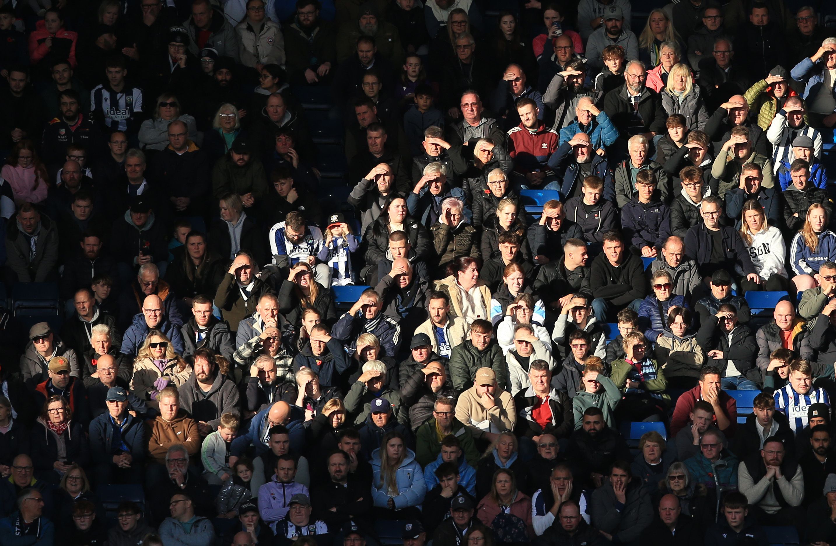A general view of several WBA fans watching a game 