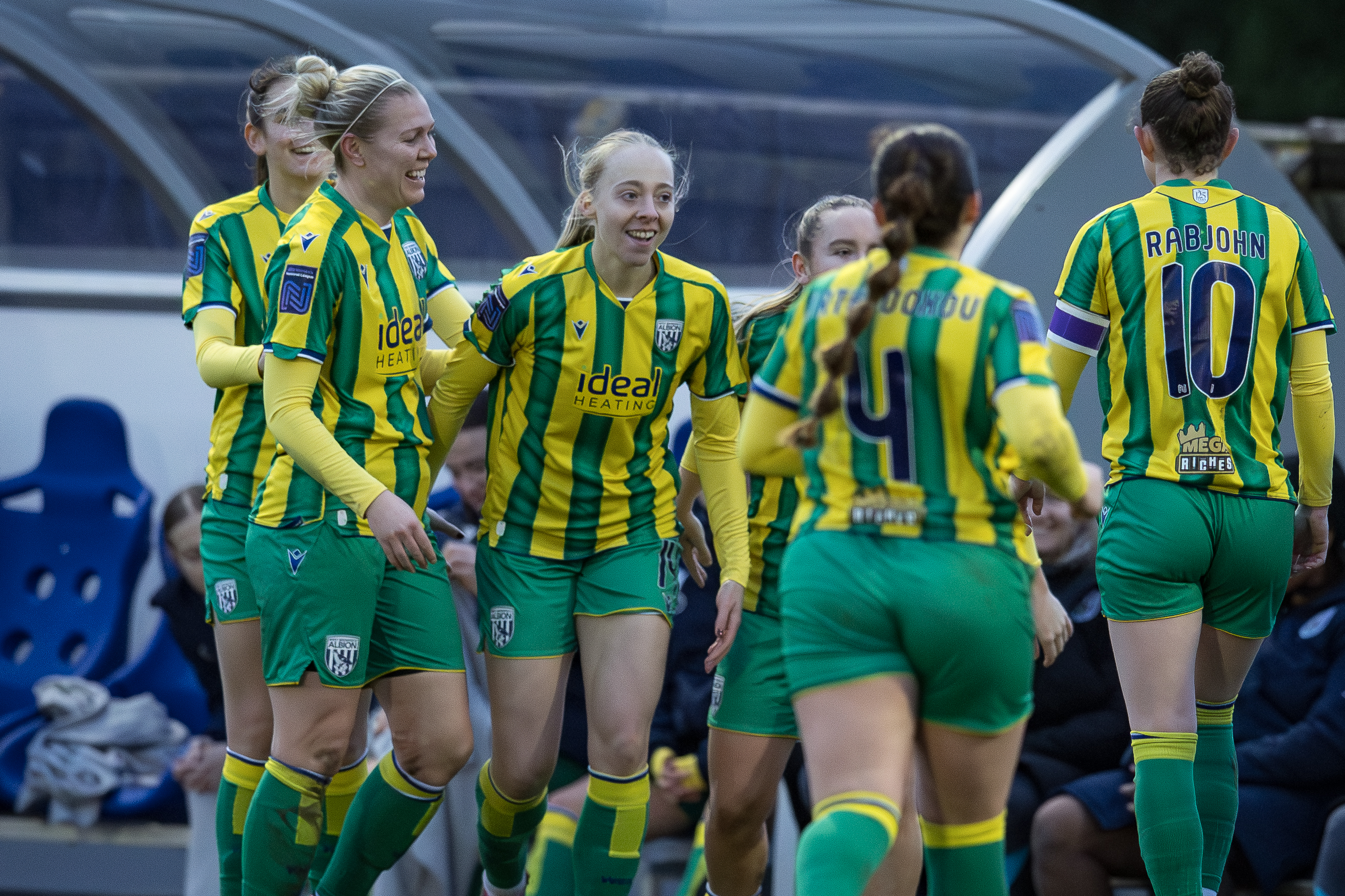 Albion celebrate Ellie May's goal against Leeds.