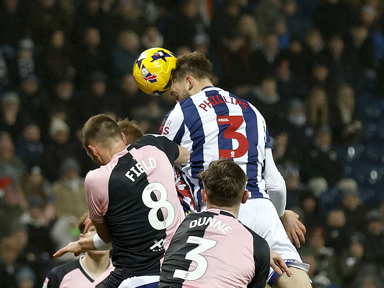 Nat Phillips wins a header against QPR 