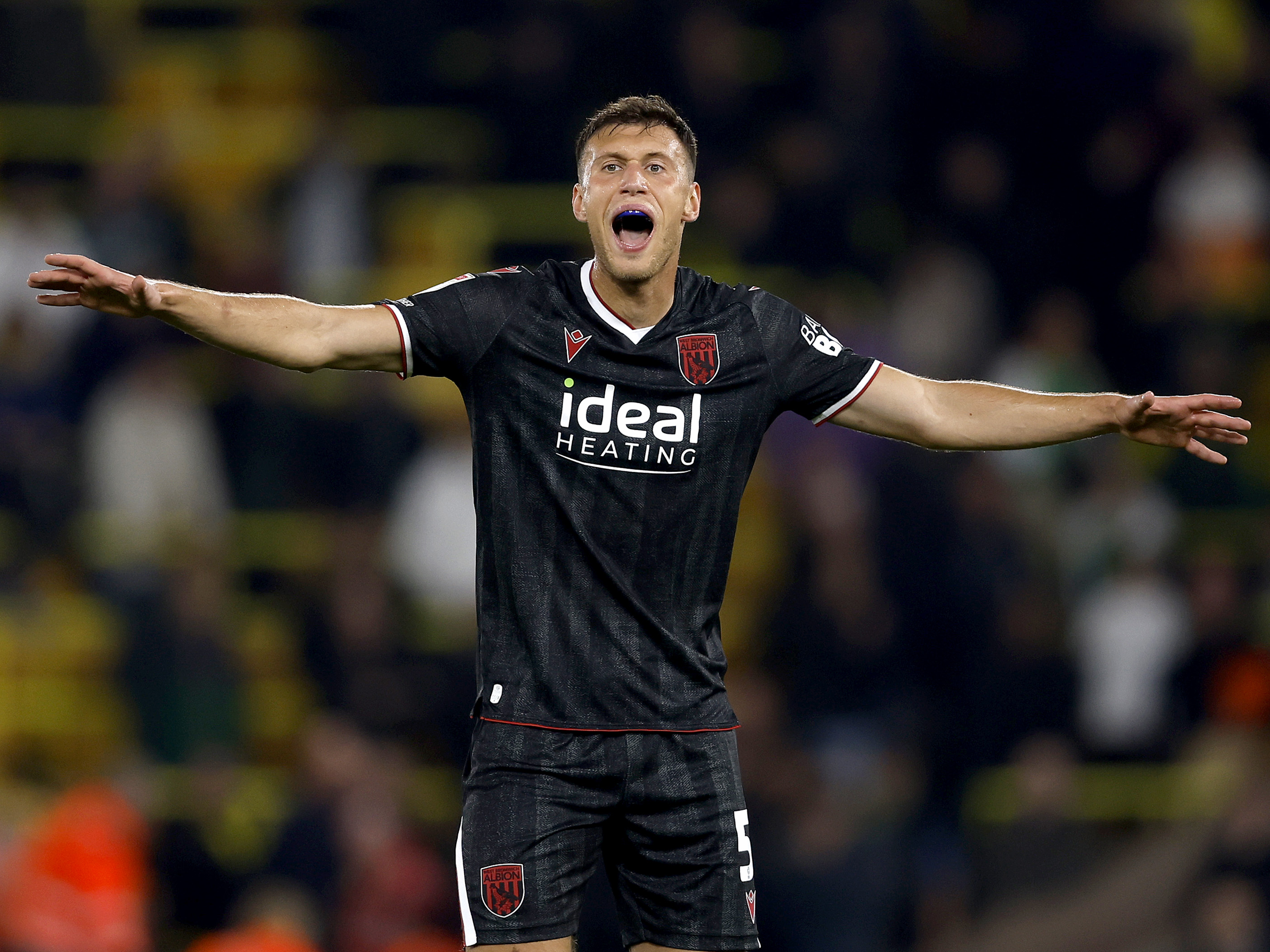 Krystian Bielik in action against Norwich City.