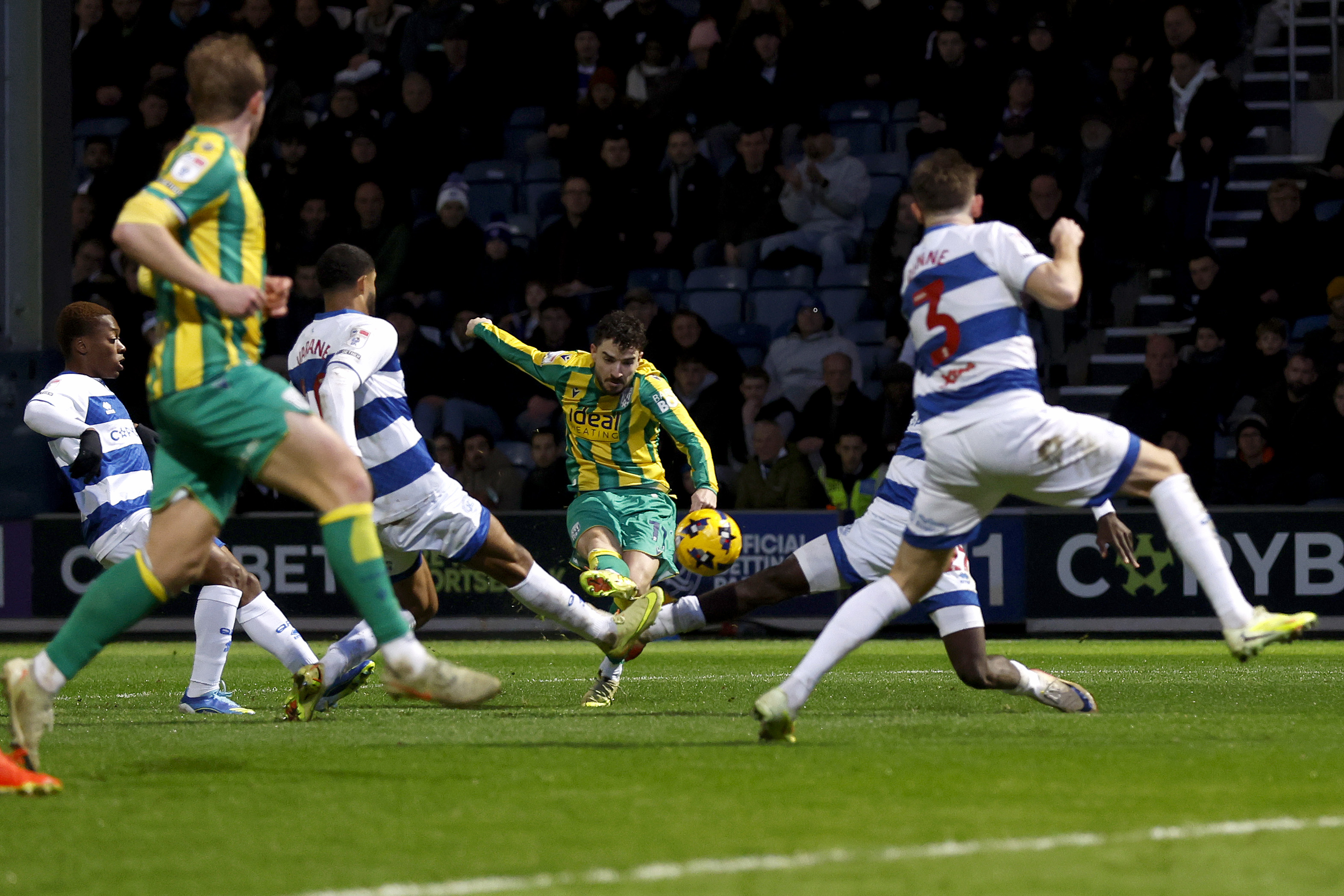 Mikey Johnston has a shot against QPR 