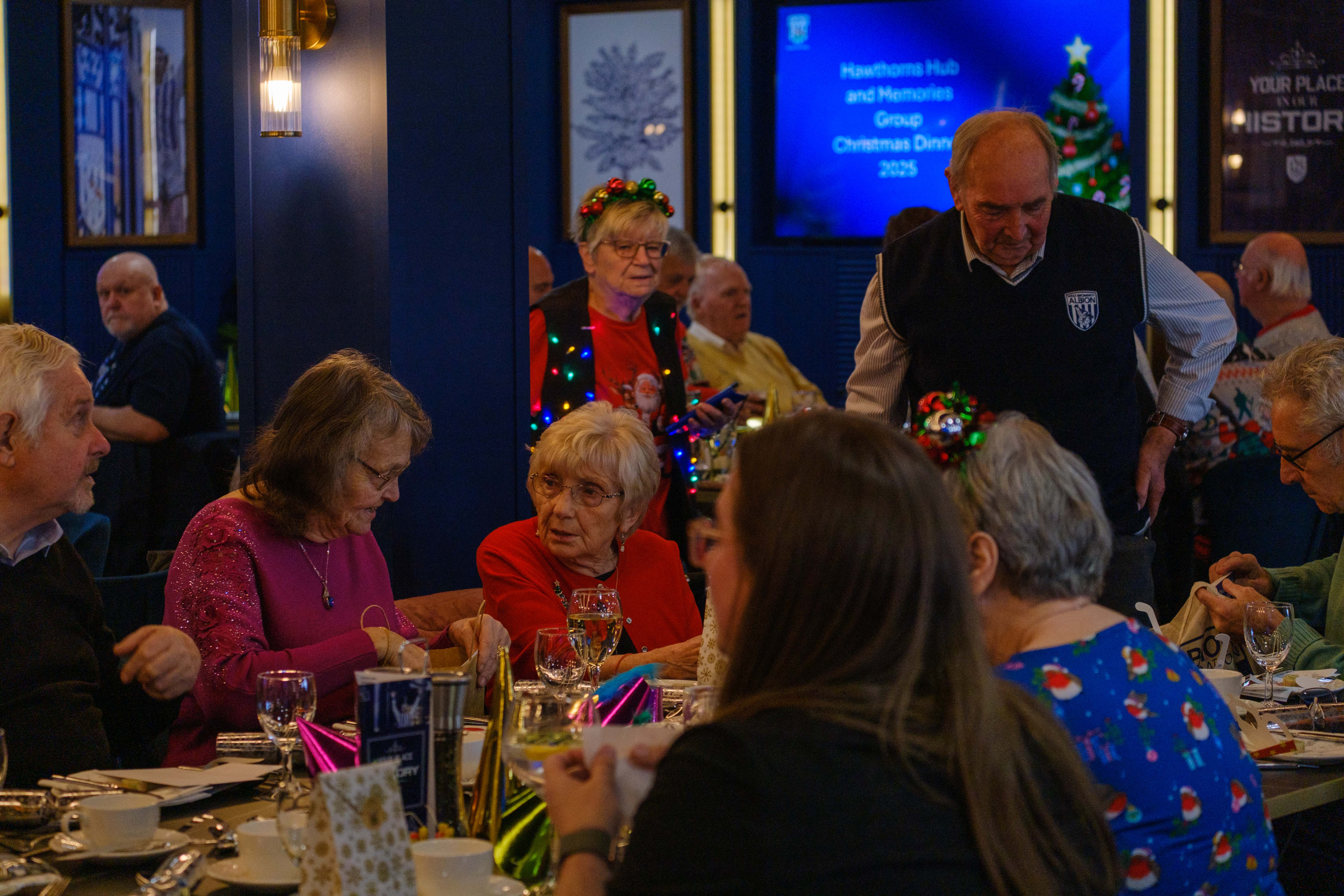 Guest seated enjoying dinner.