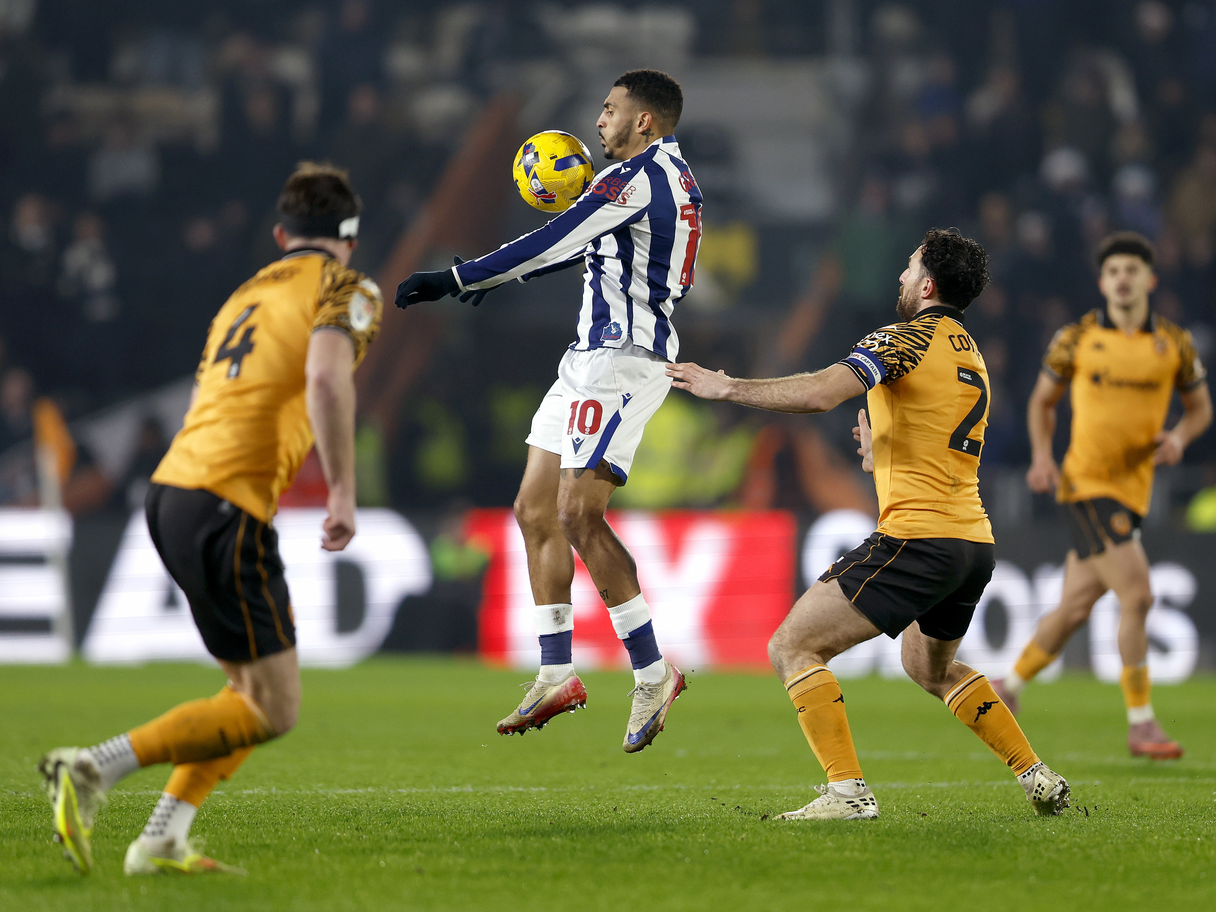 An image of Karlan Grant controlling the ball against Hull