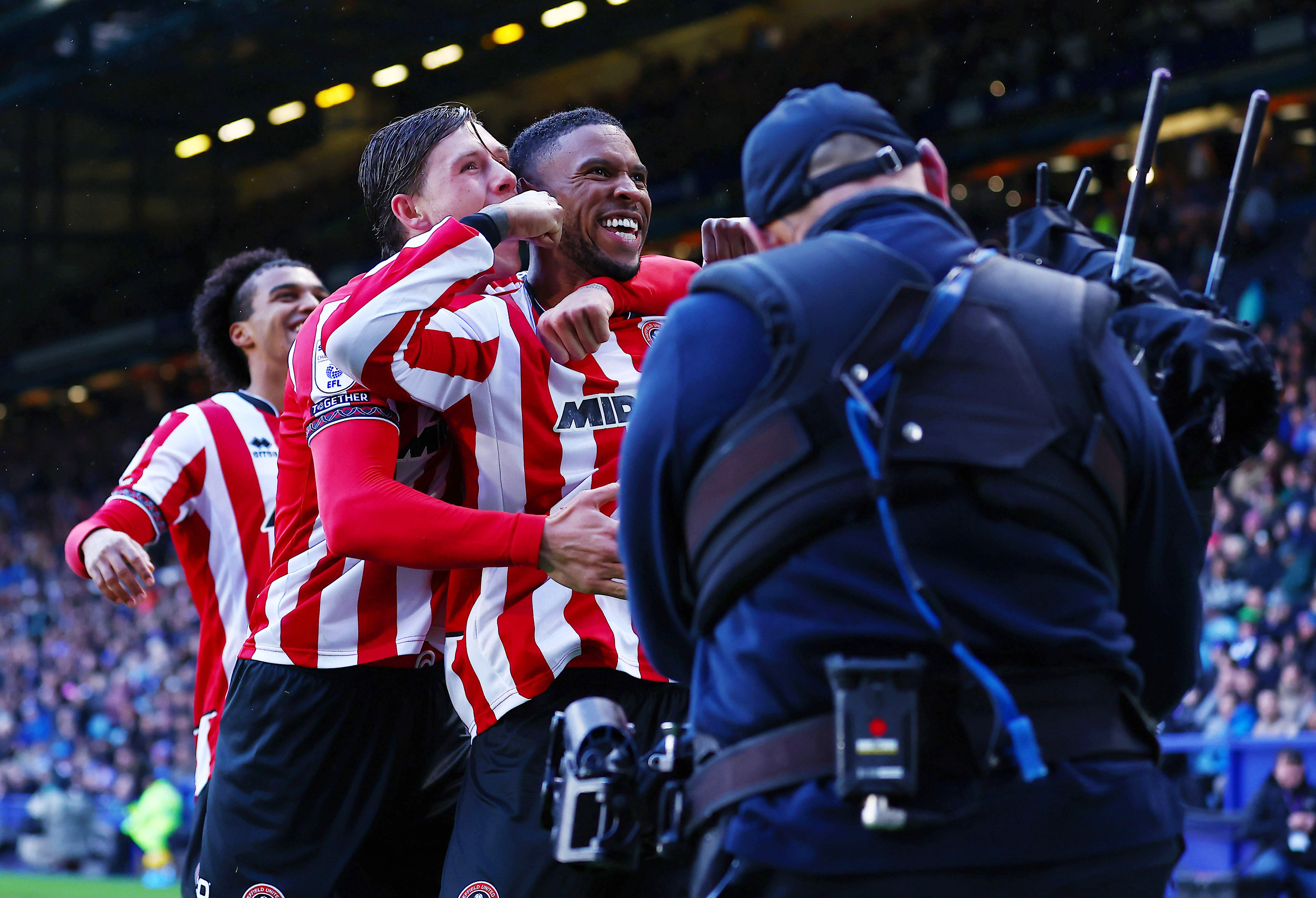 Several Sheffield United players celebrate a goal 
