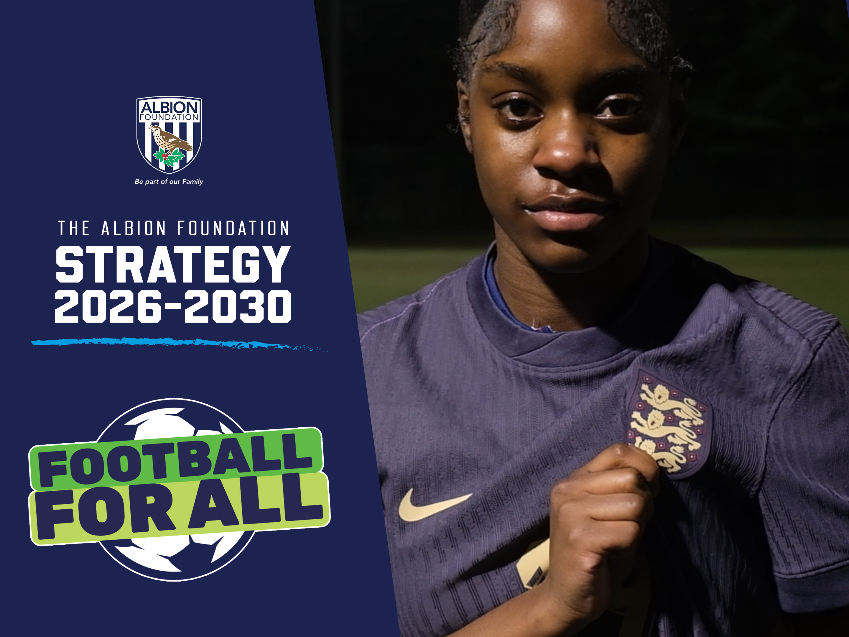 Player Asiah holding out the England badge on her shirt