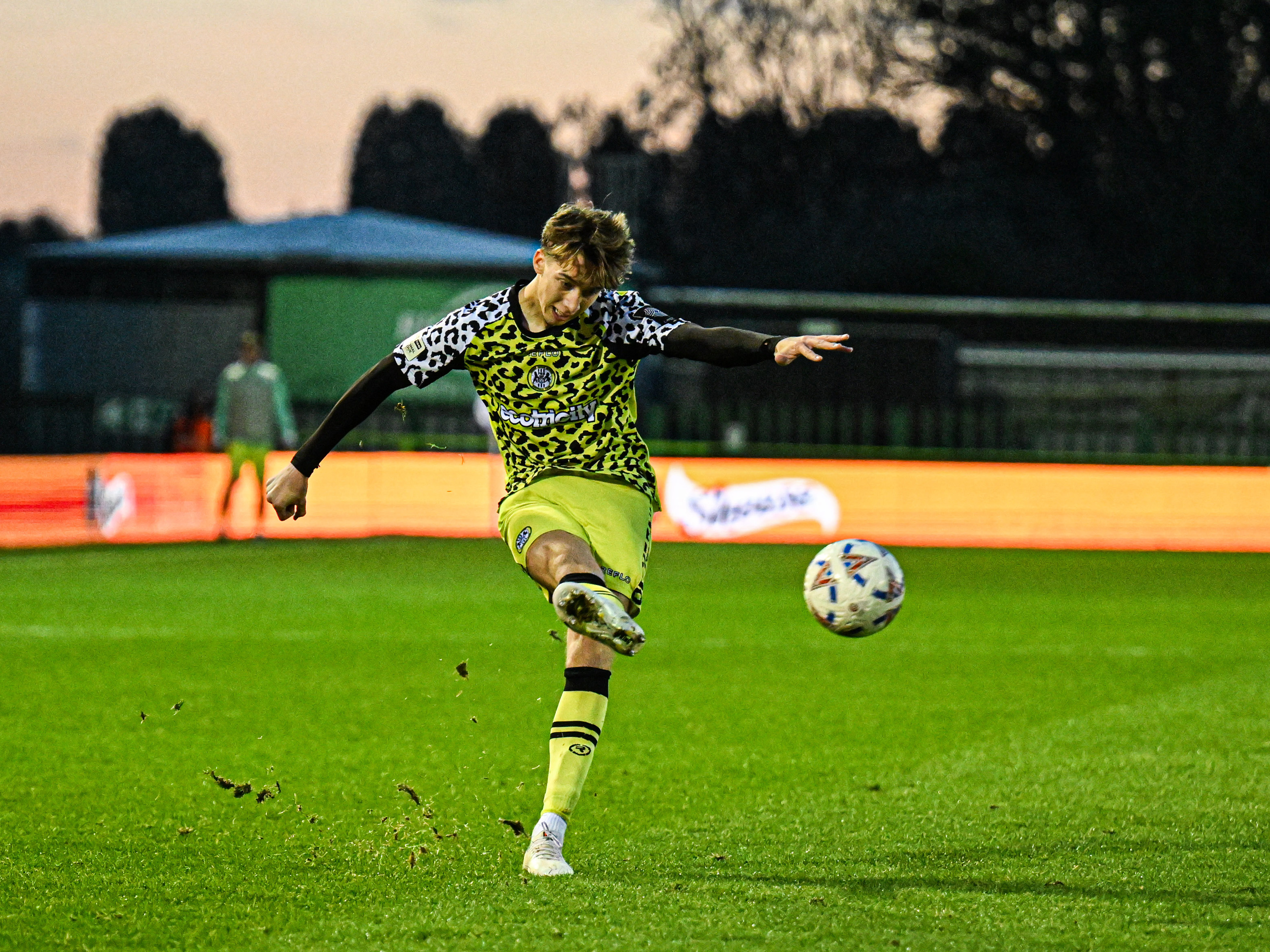 Harry Whitwell crossing the ball while playing for Forest Green Rovers