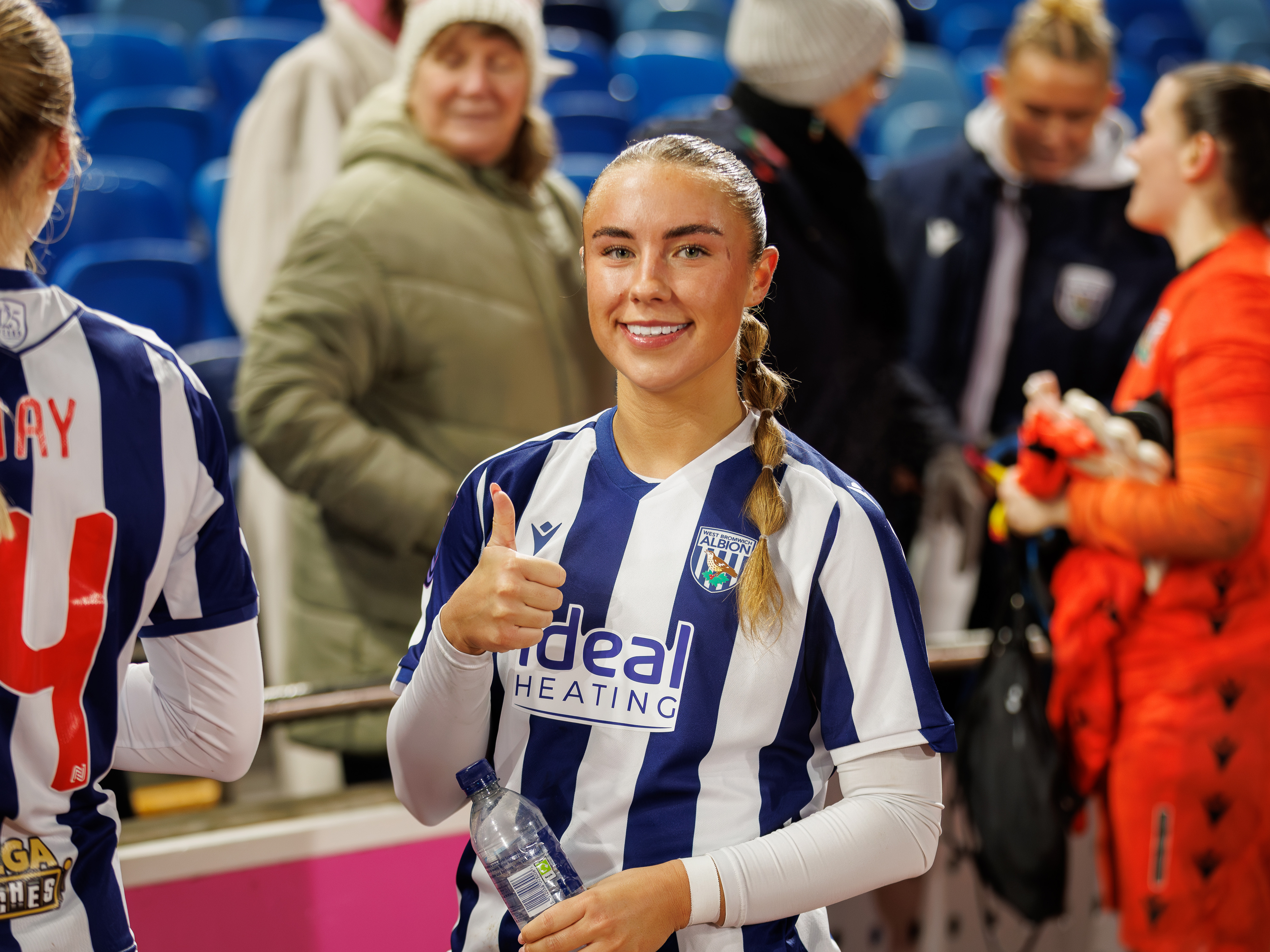 Seren Watkins sticking her thumb up to the camera.