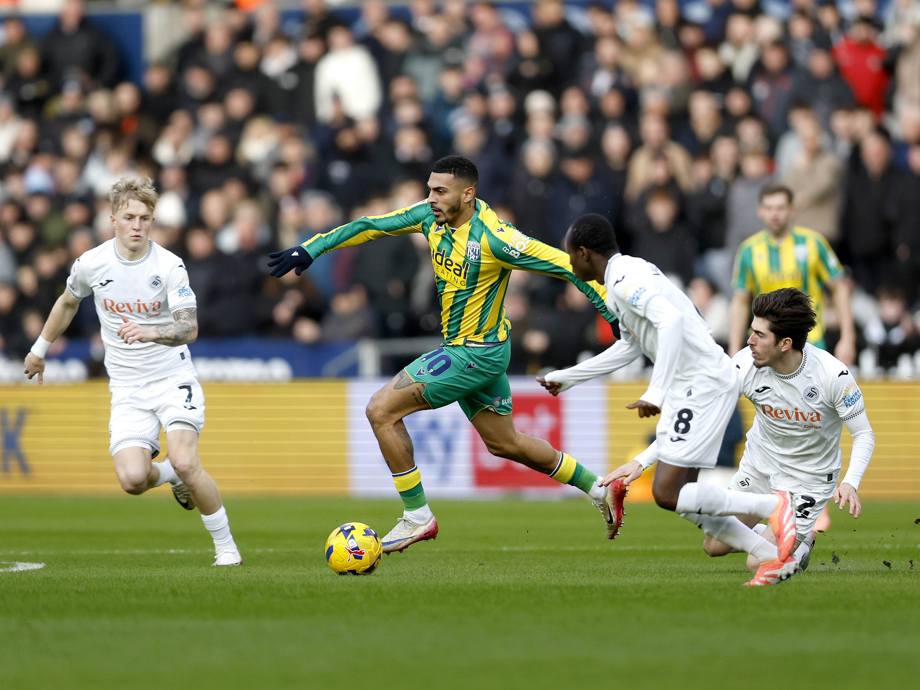 An image of Karlan Grant on the ball against Swansea