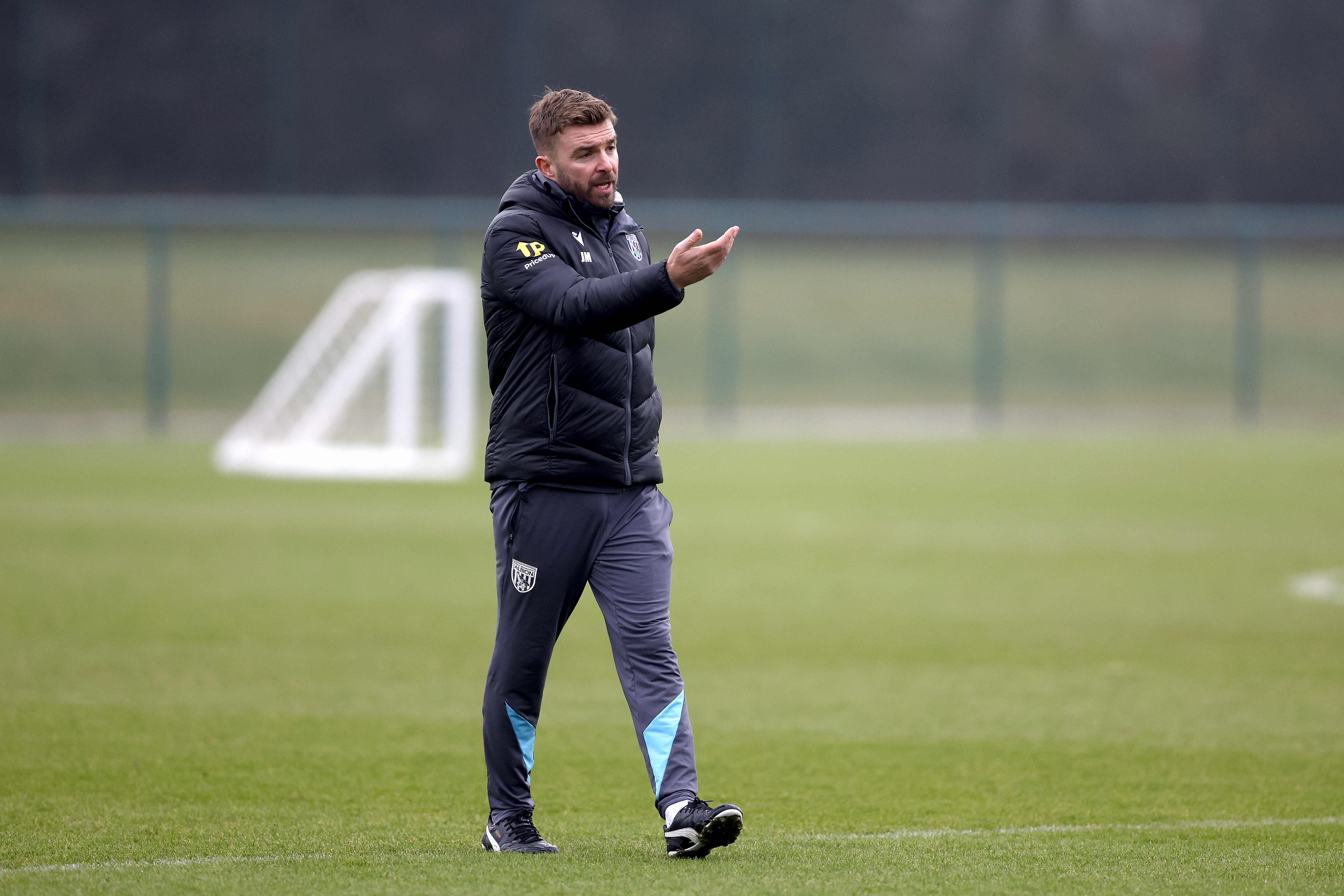 James Morrison delivering instructions to players during a training session