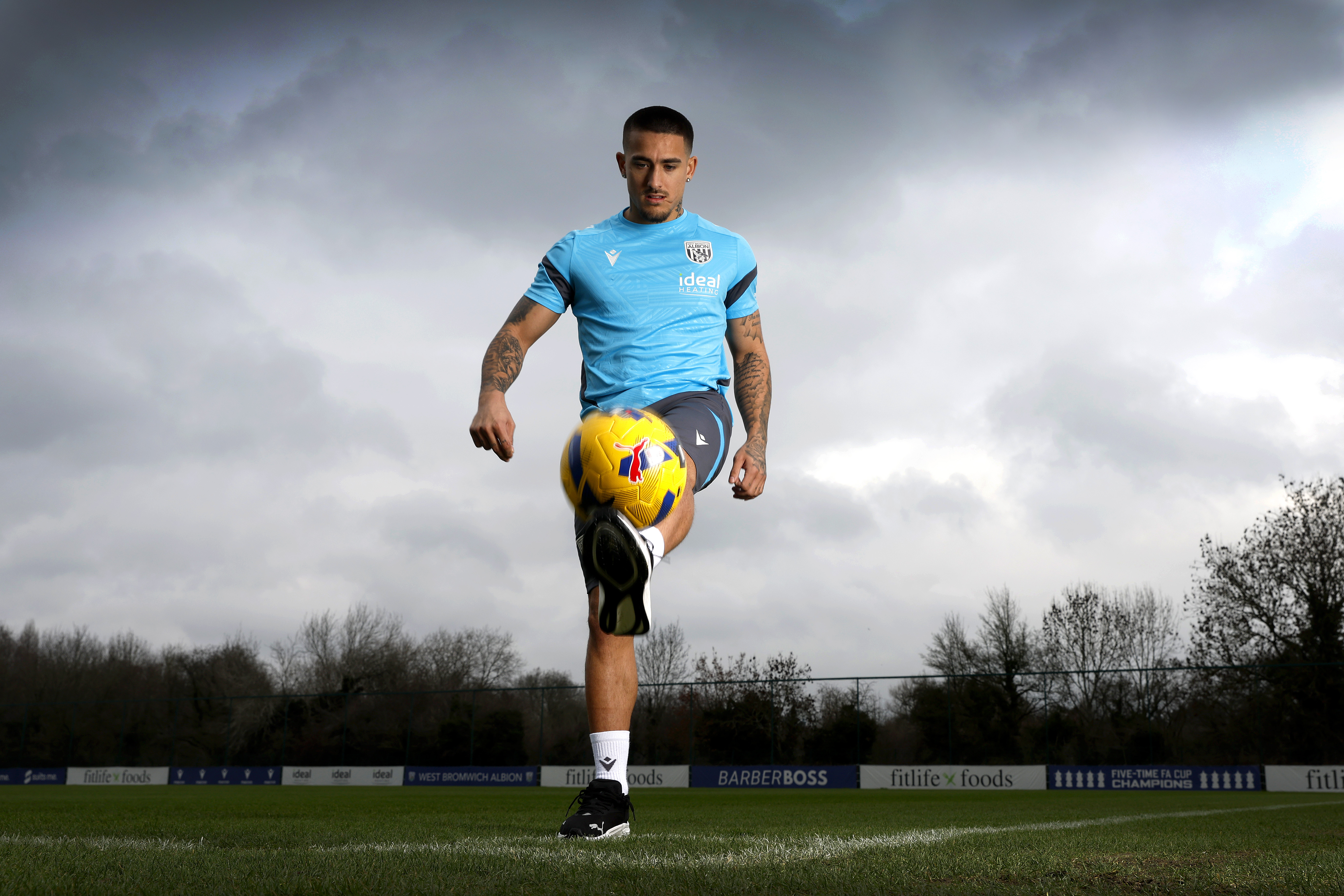 Danny Imray juggling a ball out on the training pitch 