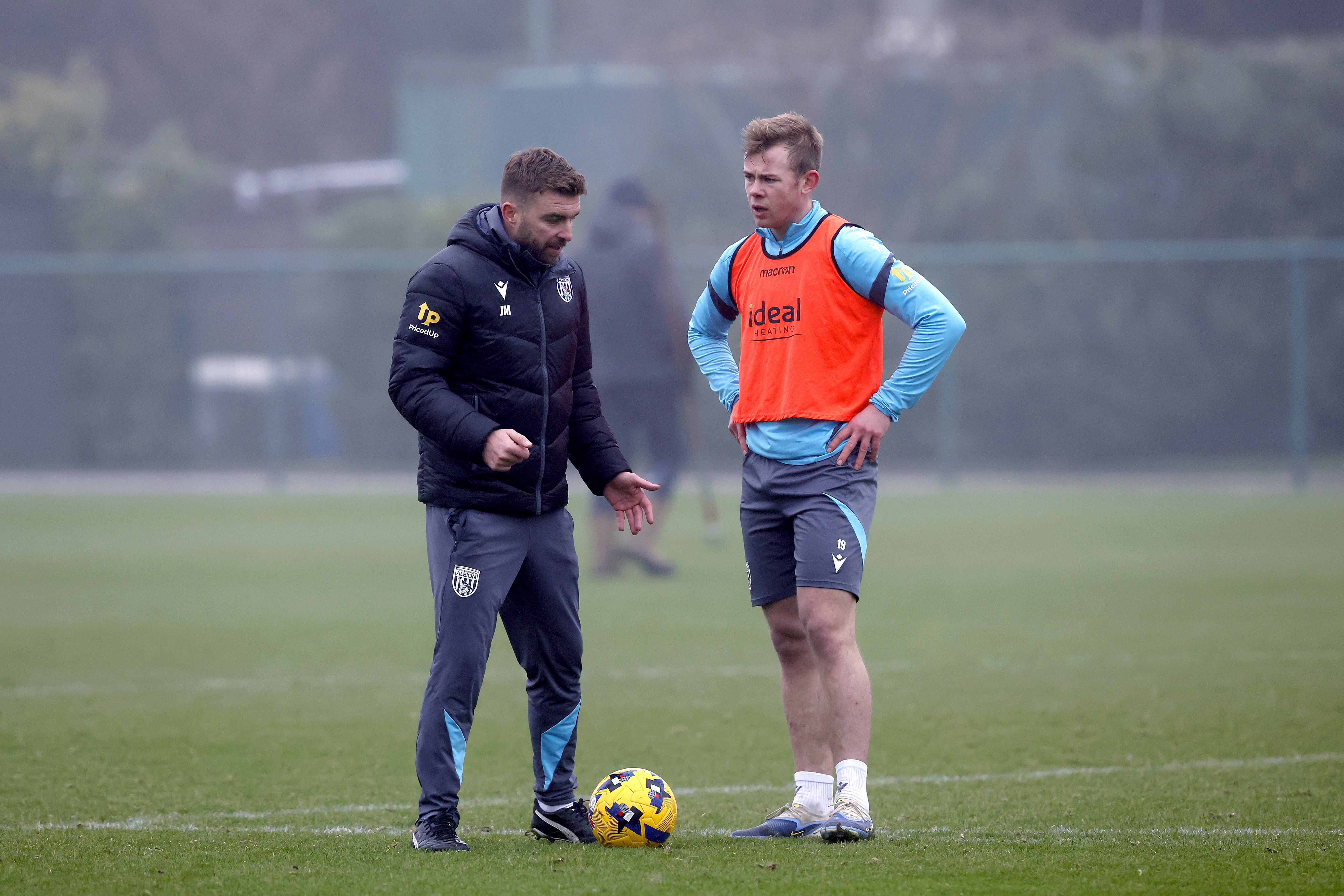 James Morrison chatting to Aune Heggebø on the training pitch 