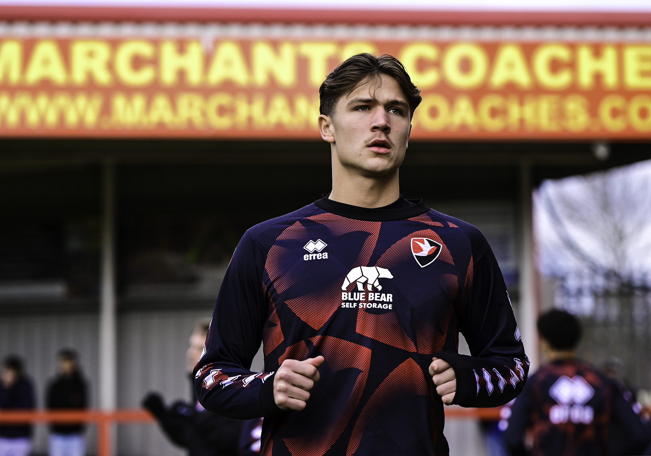 Cole Deeming warming up before a Cheltenham Town game