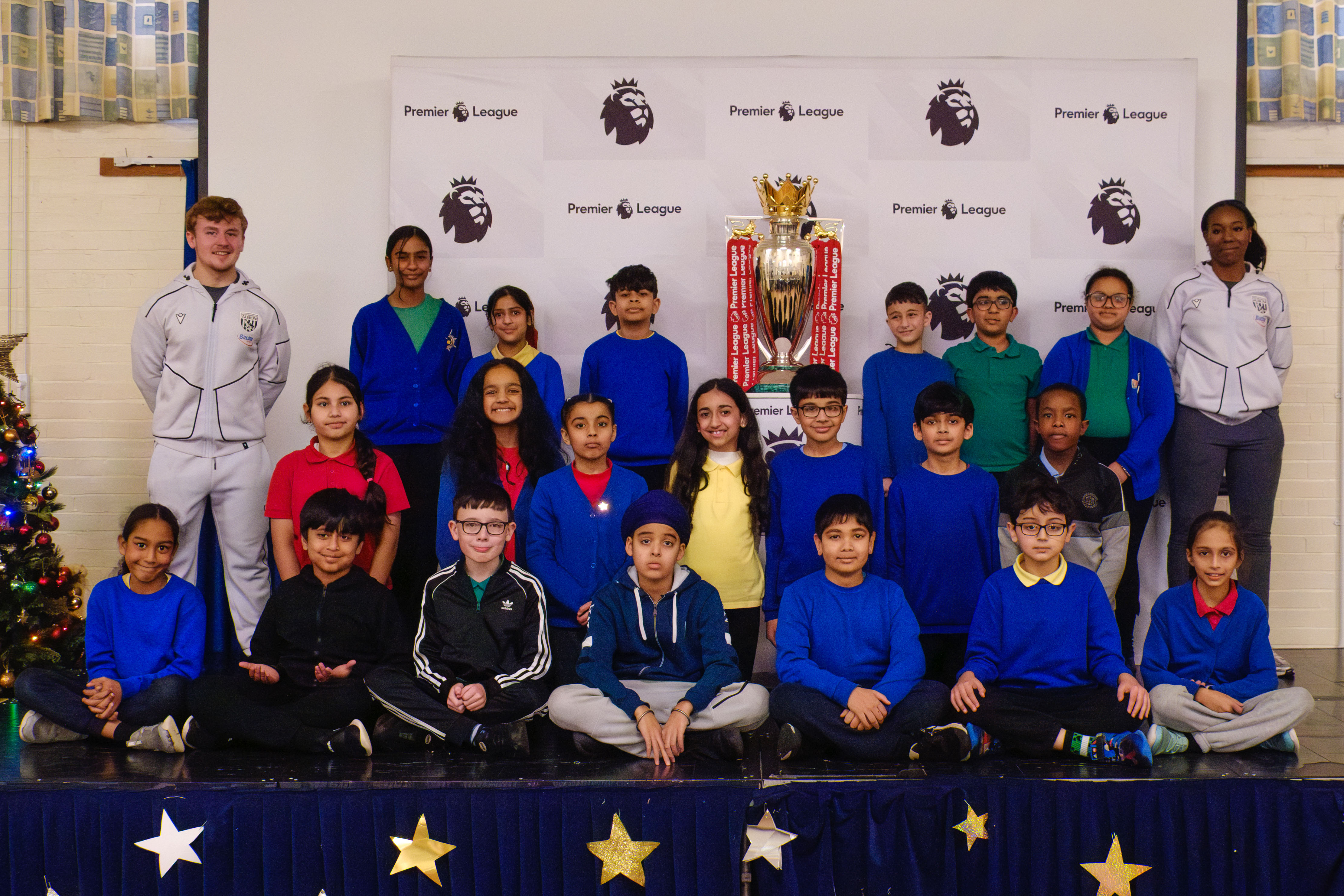 Tividale Community Primary School pupils with the Premier League Trophy
