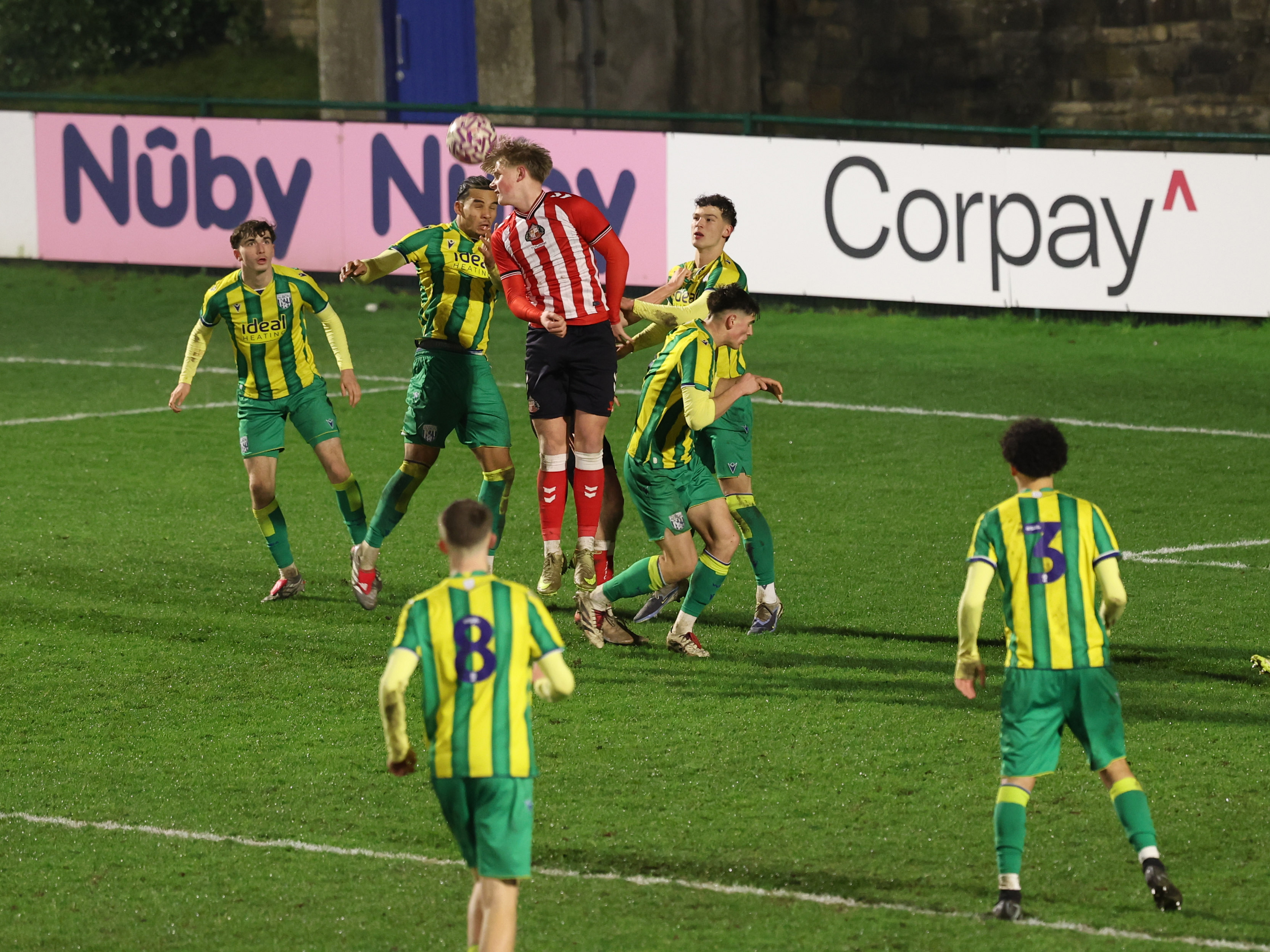 A photo of Albion U18 players in the 2025/26 green and yellow away kit