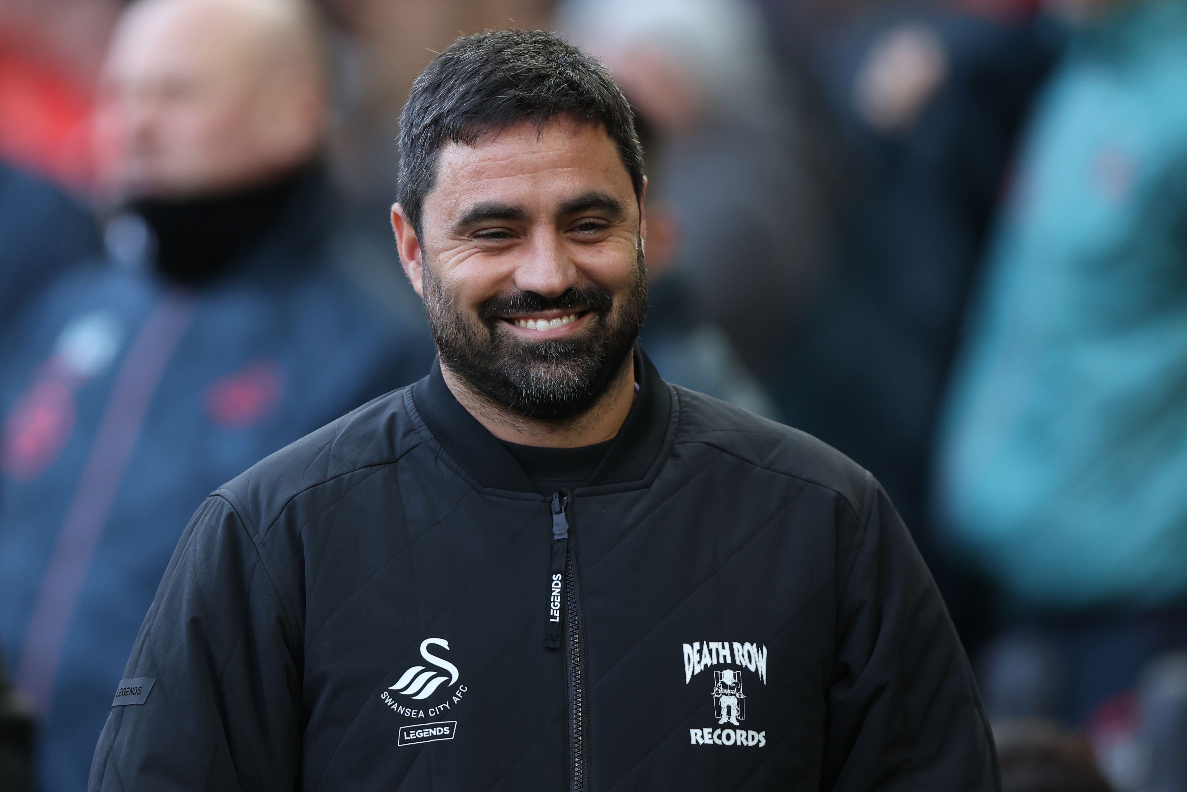 Swansea boss Vitor Matos smiling 