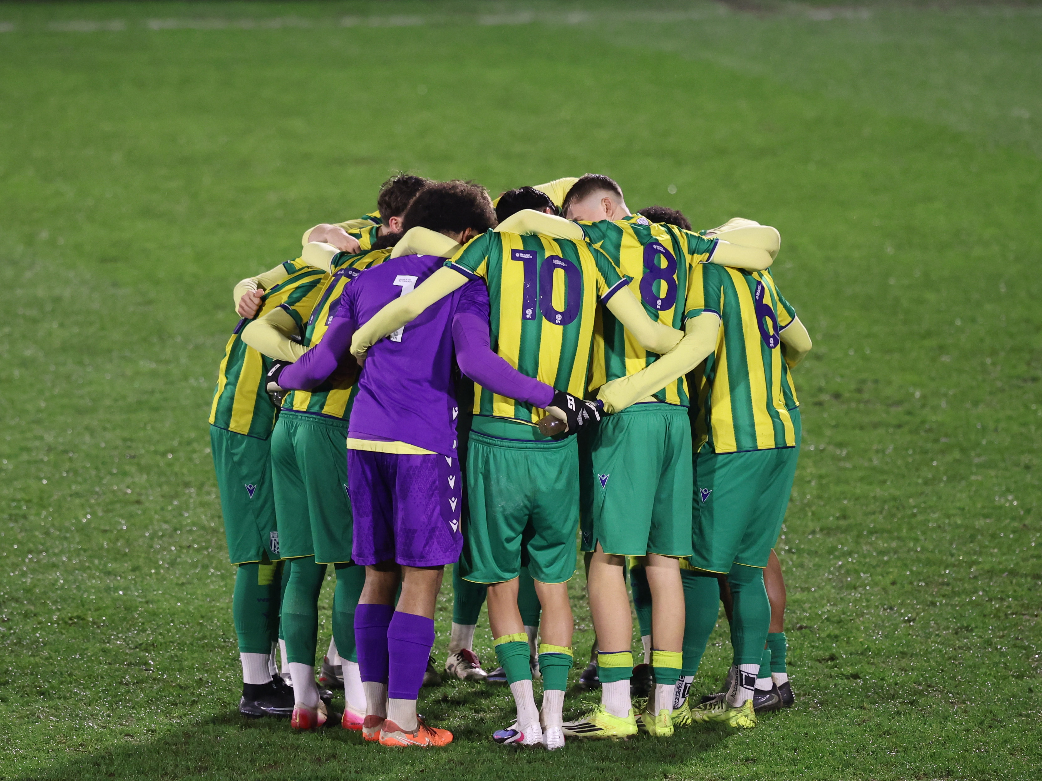 A photo of Albion U18s in the 2025/26 green and yellow away kit