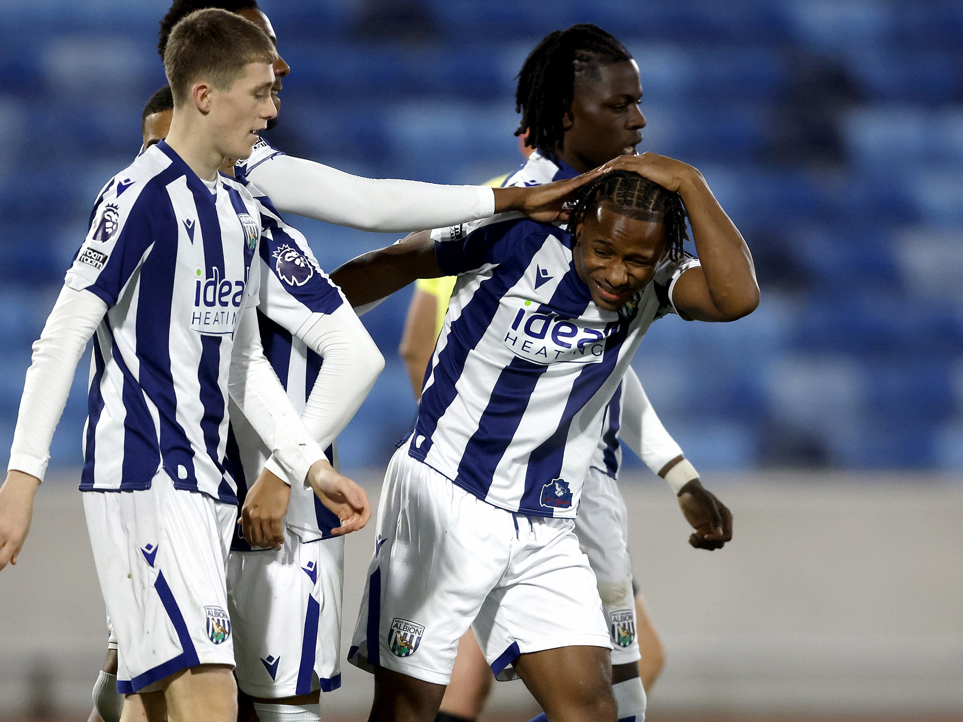 Remar McNeil celebrates scoring.