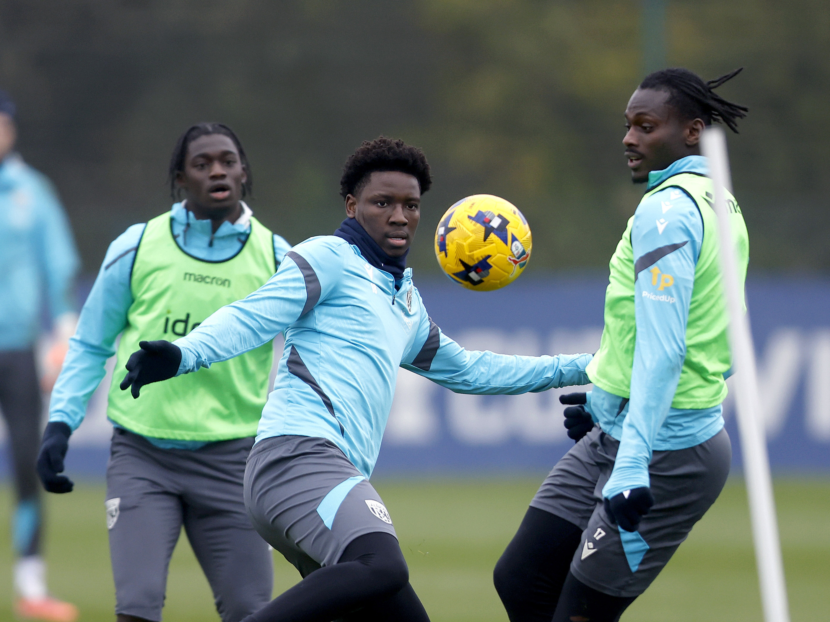 Jamal Jimoh-Aloba on the ball in training with Ousmane Diakité and Hindolo Mustapha close by