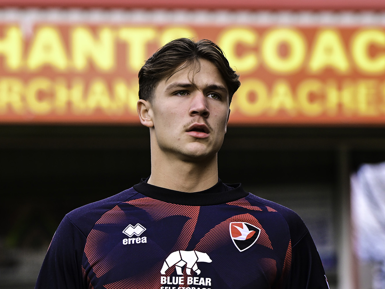 A photo of Cole Deeming in action for loan team Cheltenham Town