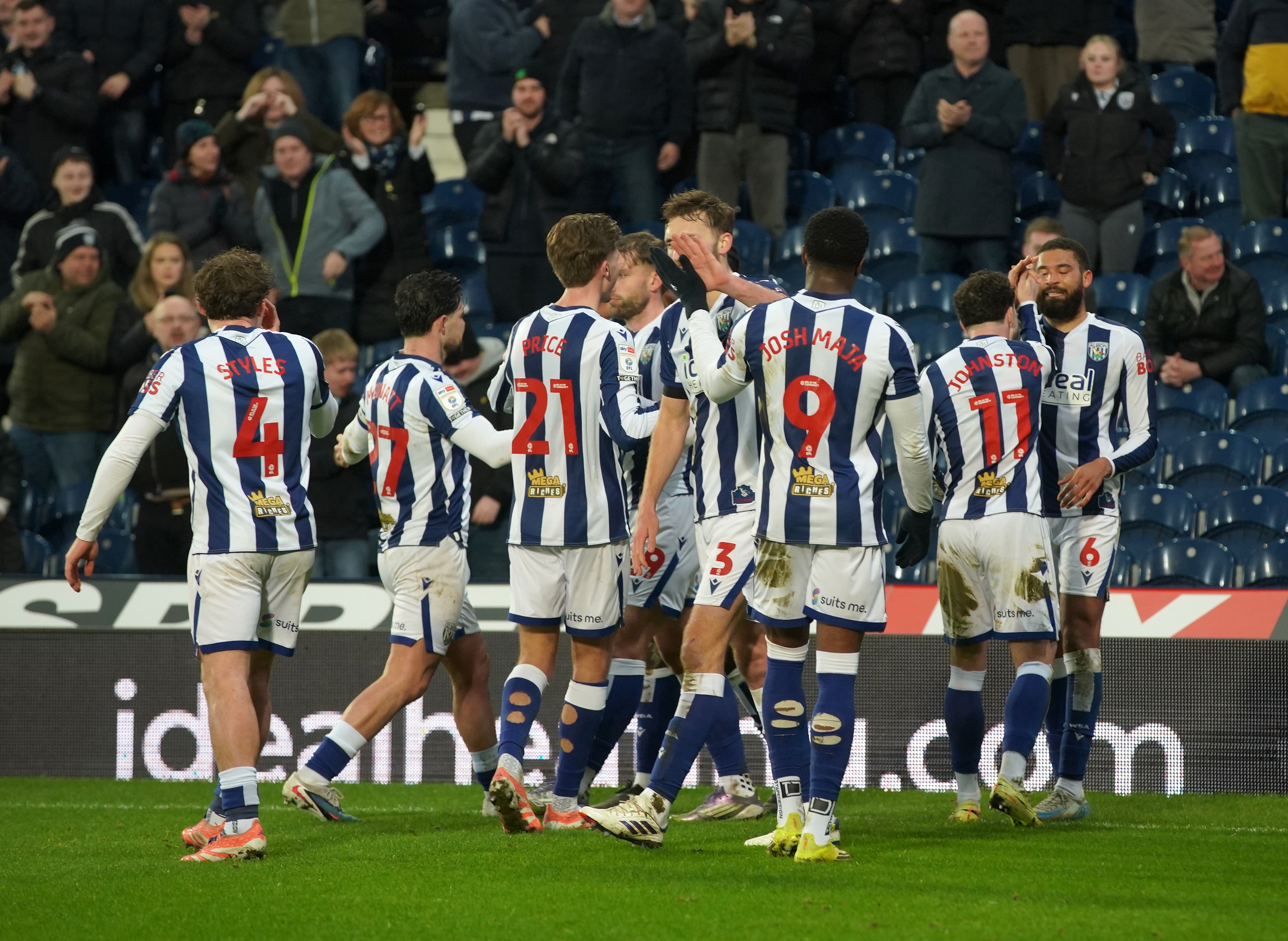 George Campbell celebrates with team-mates after scoring against Charlton